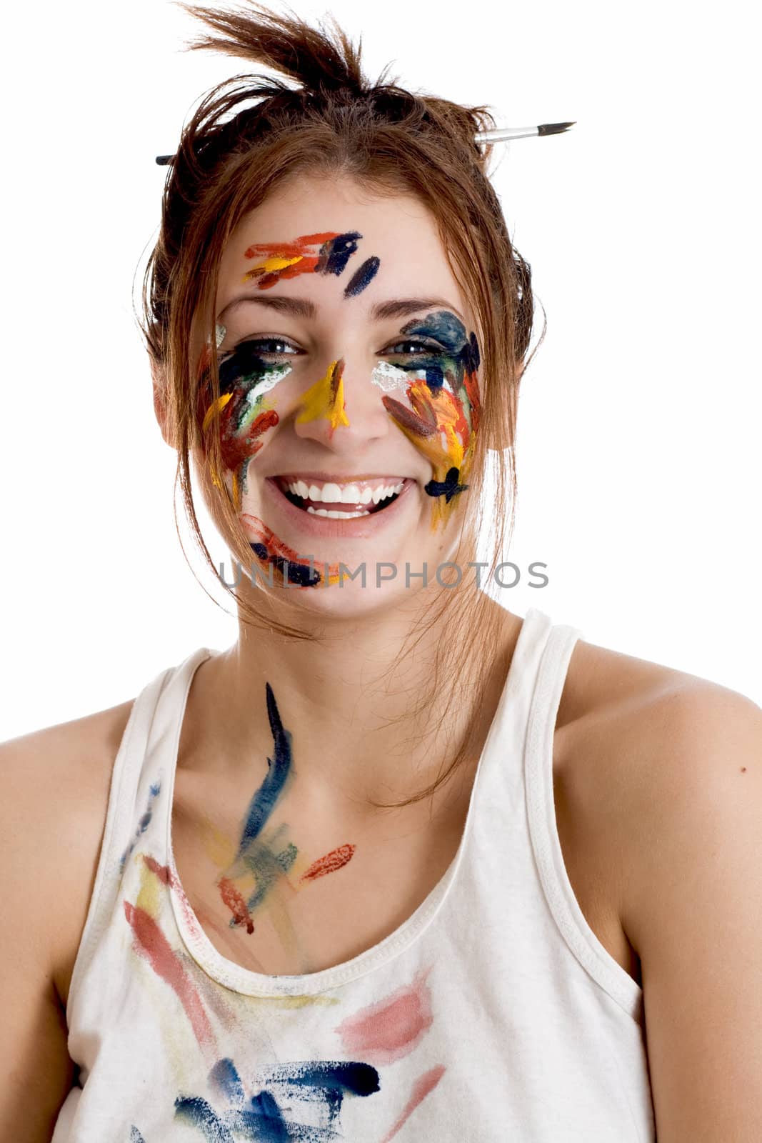 Female artist with paint smeared face isolated on white background