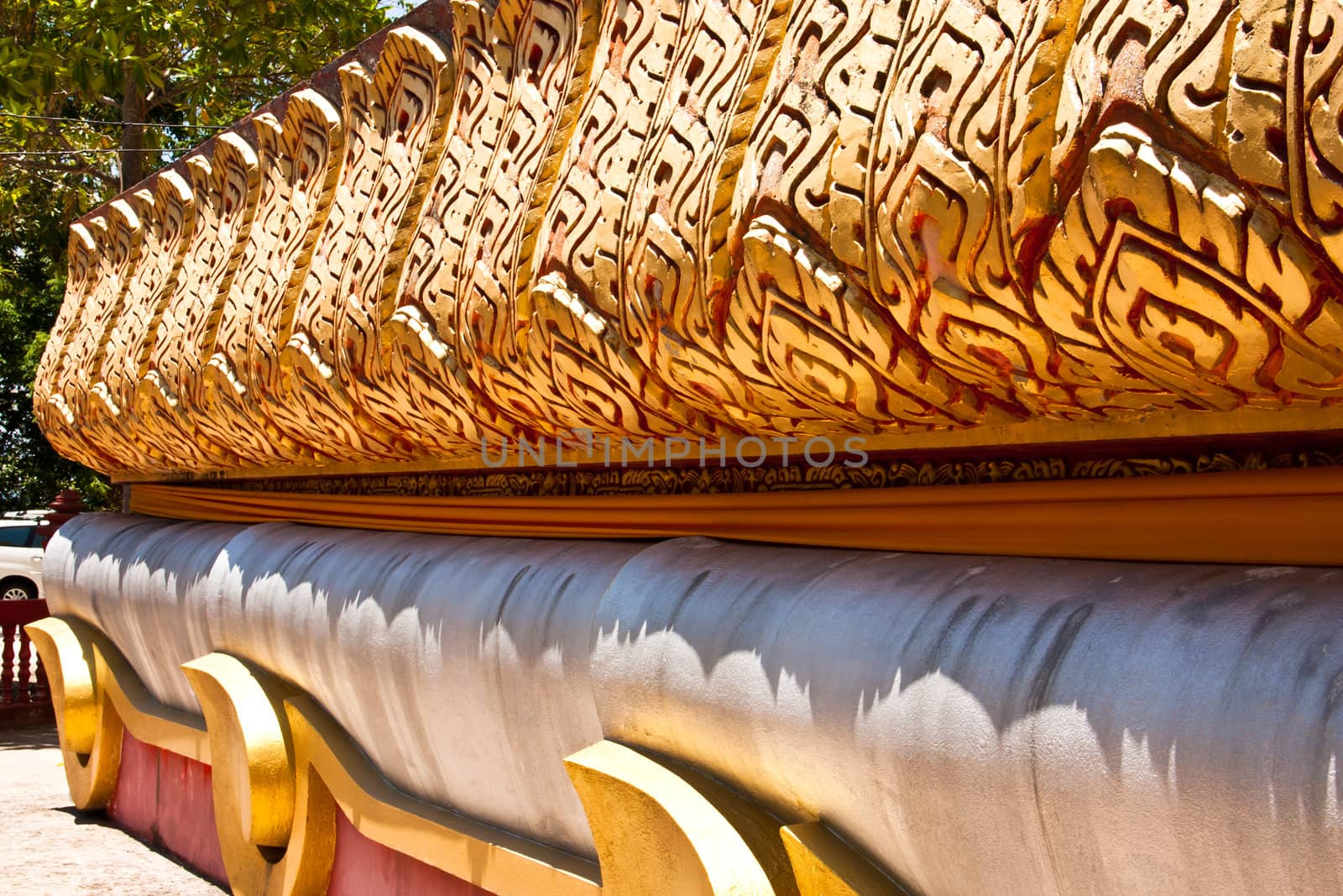 Wall sculpture of the temple in Thailand.
