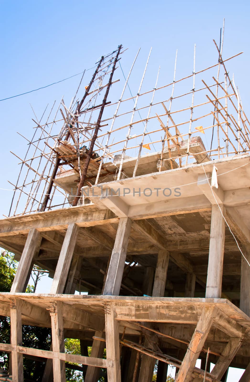 During construction of the building structure.