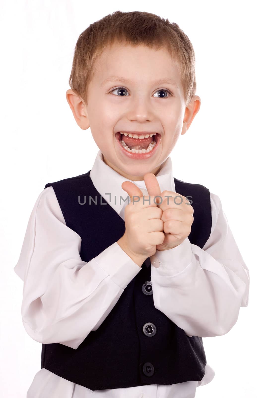 Happy boy shows the sign OK on a white background
