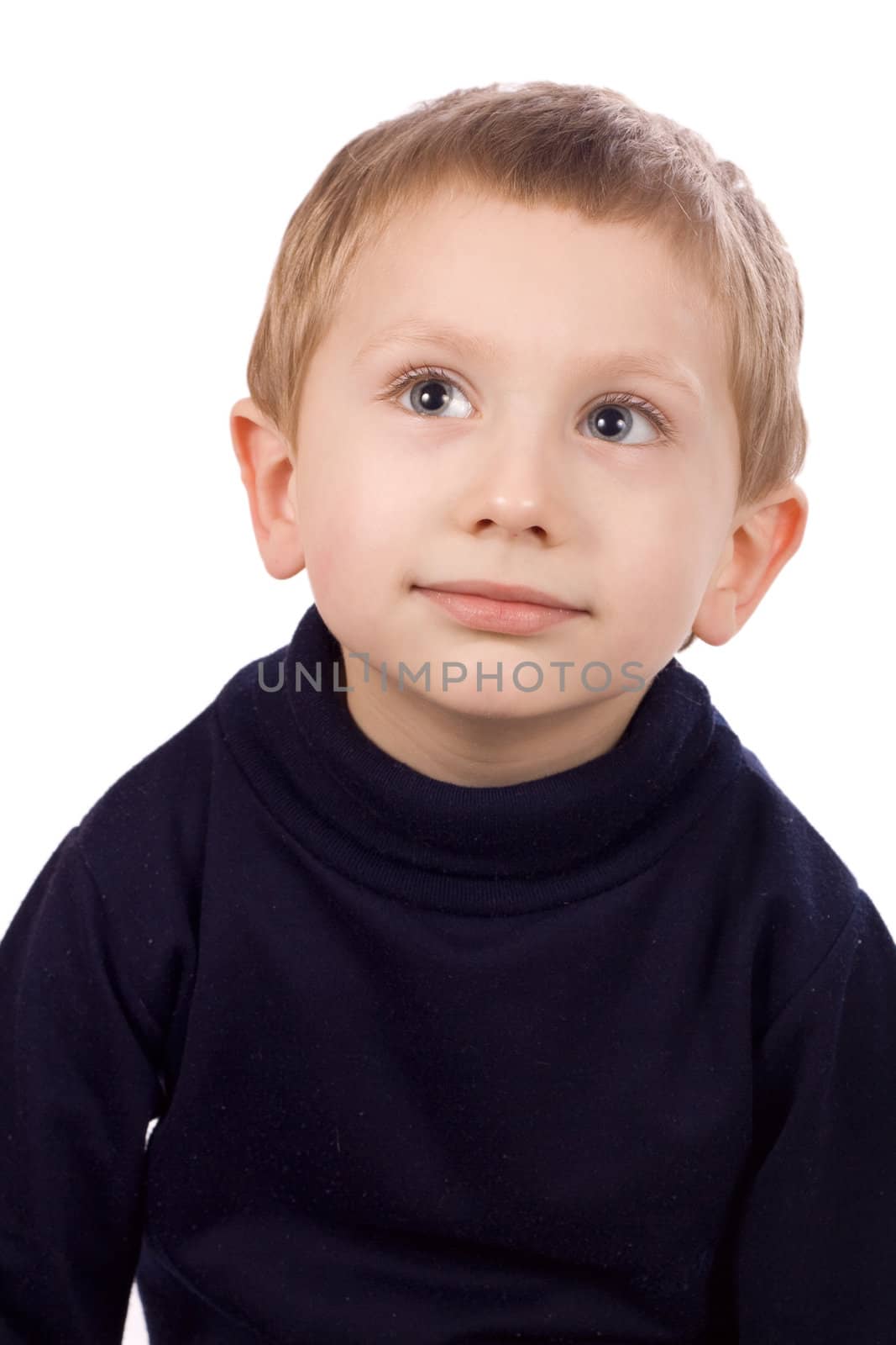 Portrait of a boy looking up isolated on white background
