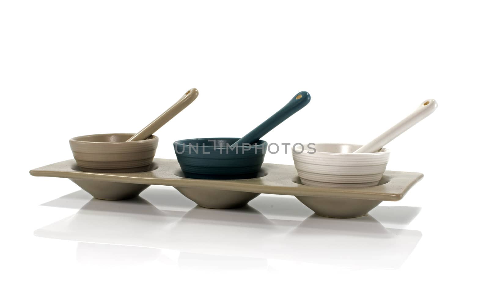 three porcelain cups isolated on white