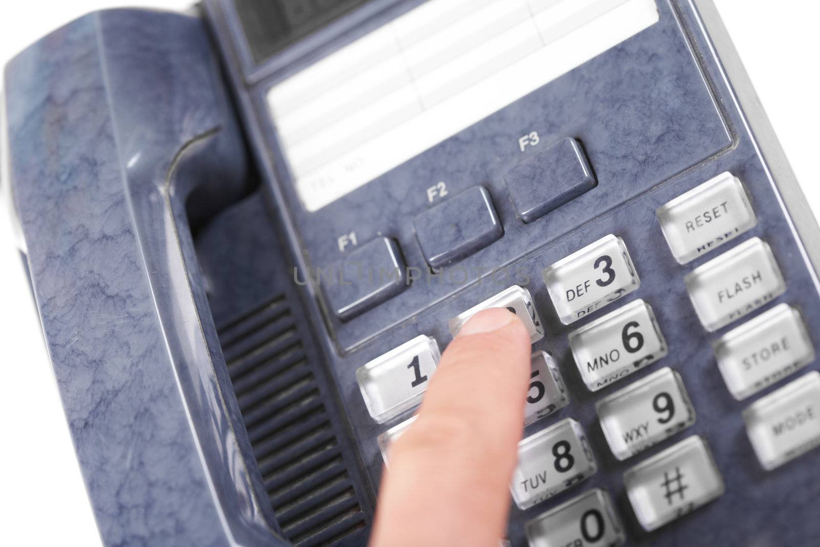 The dark blue telephone on a white background