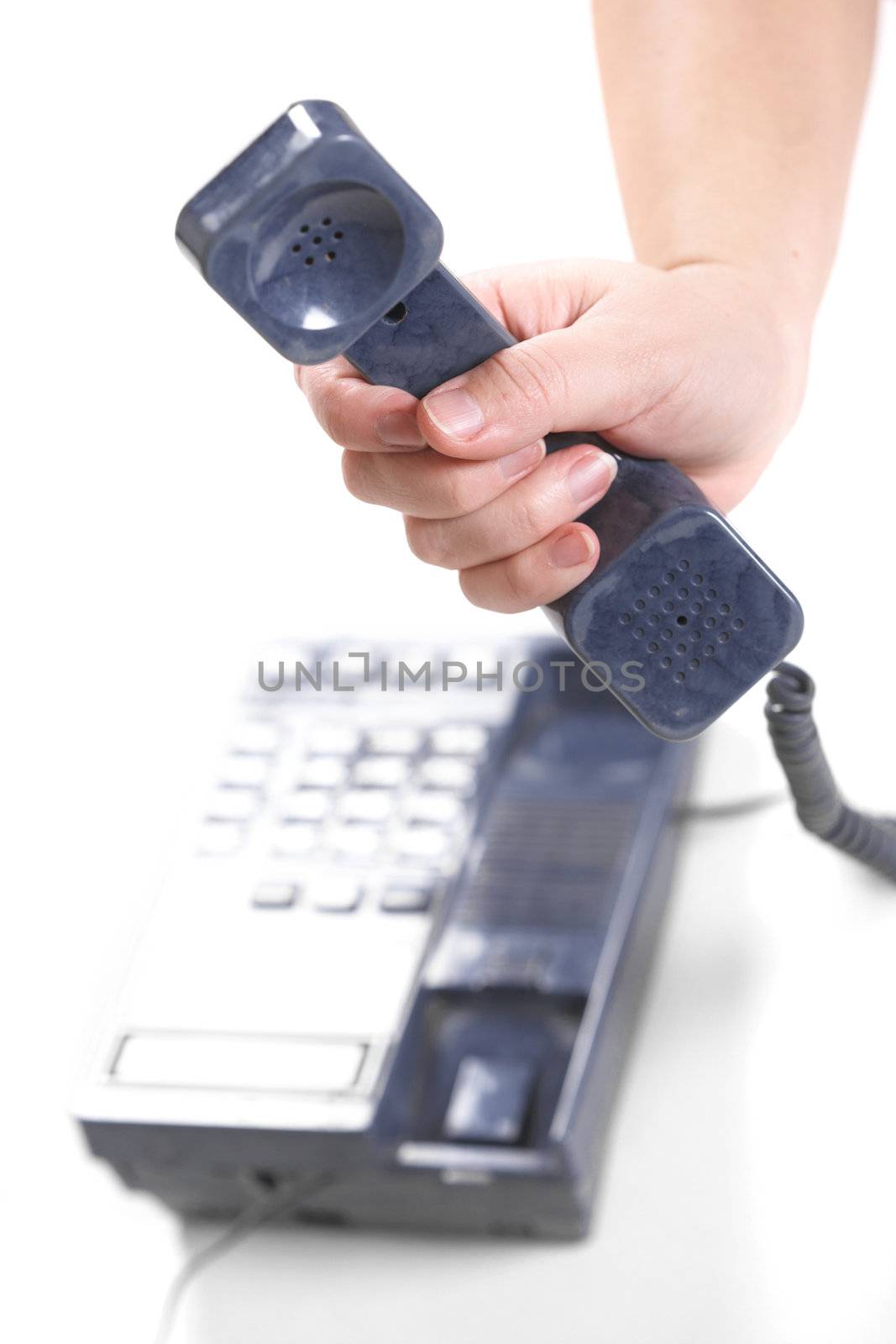 Businesswoman. The dark blue telephone on a white background