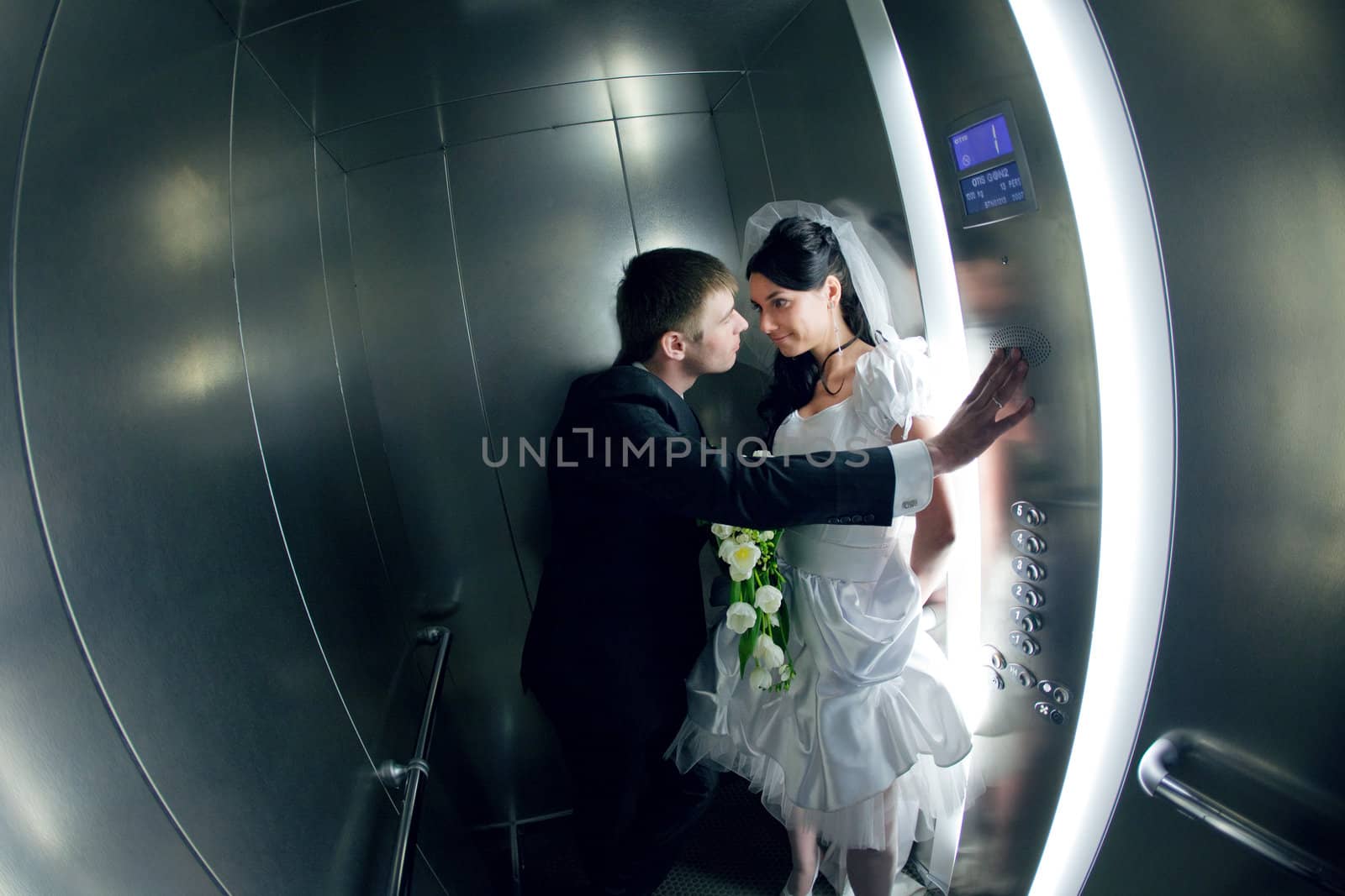 happy couple in the lift