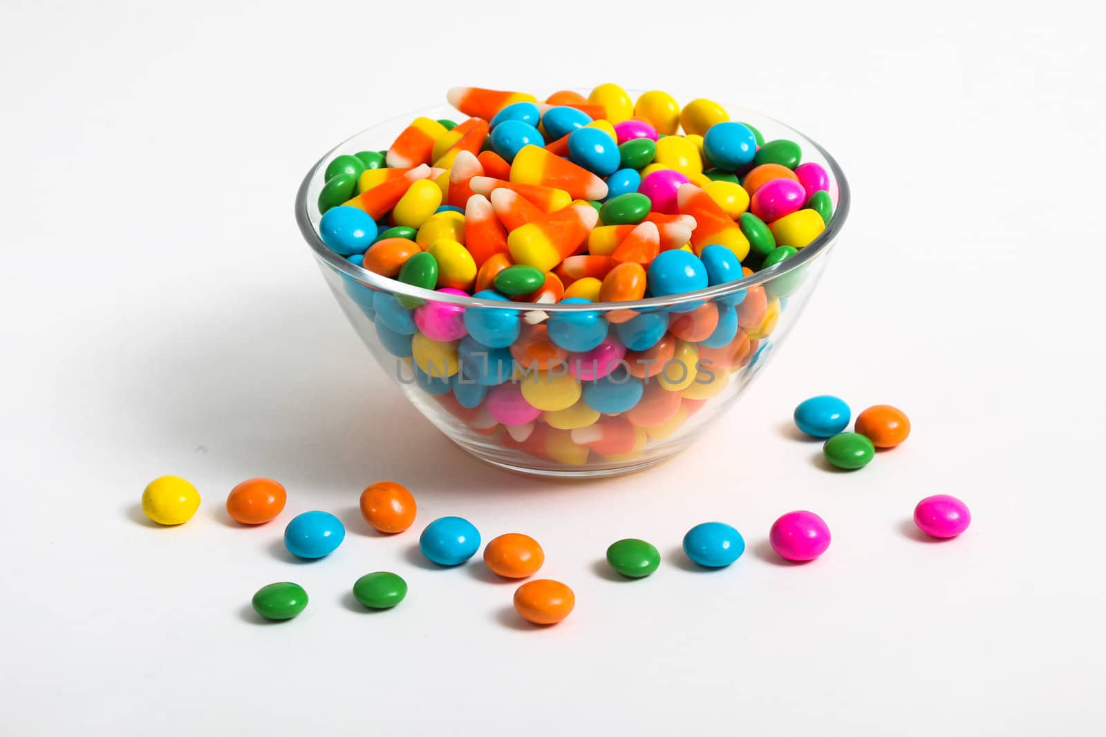 Colored candy inside glass bowl