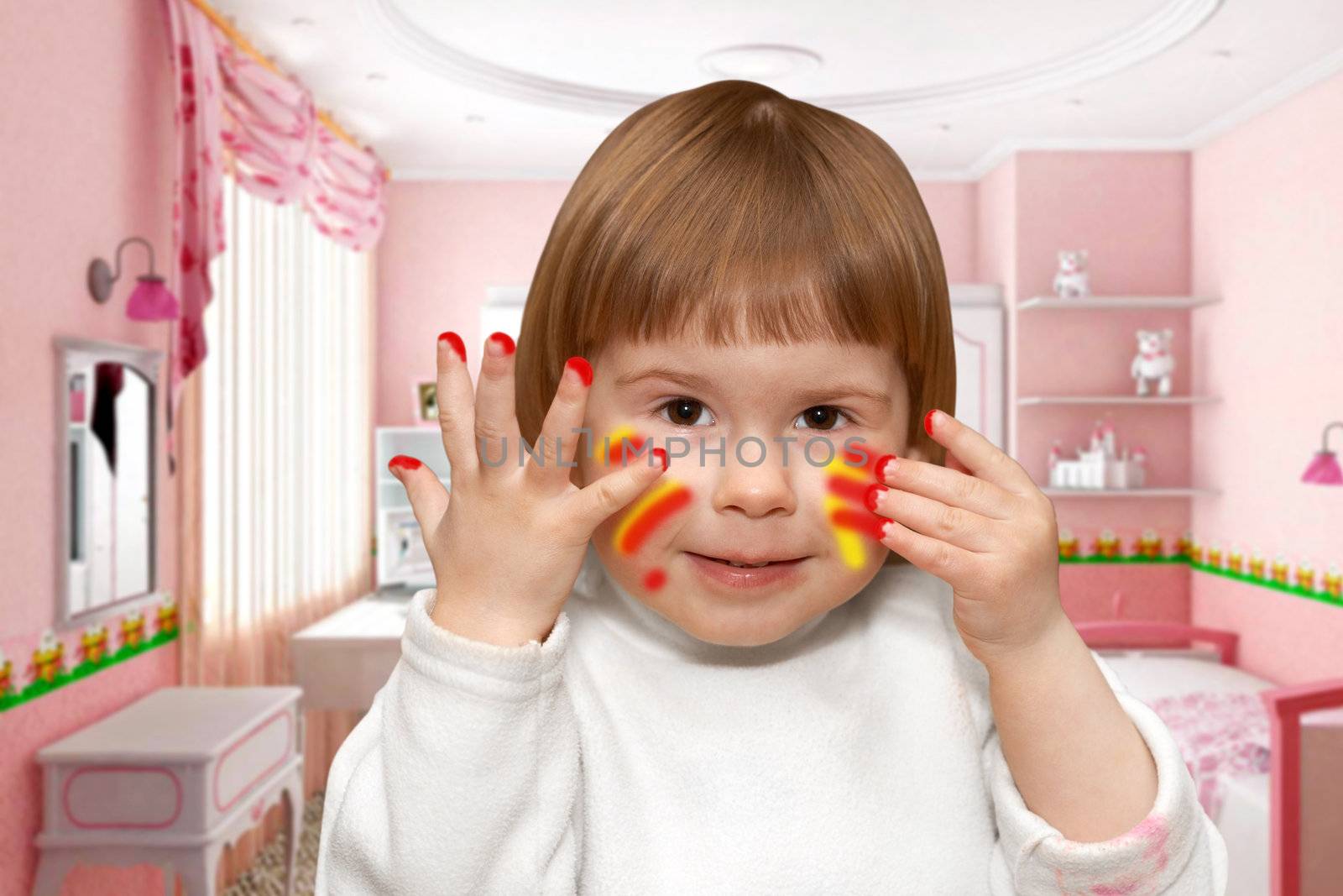 The small girl with the soiled hands in a room