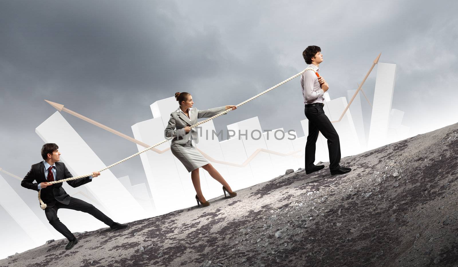 Three business people pulling rope by sergey_nivens