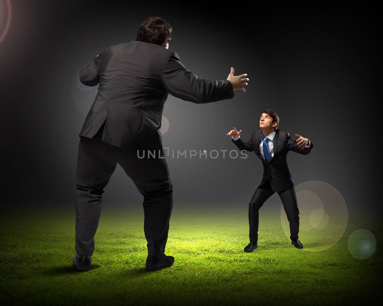 Image of businesspeople arguing and acting as sumo fighters