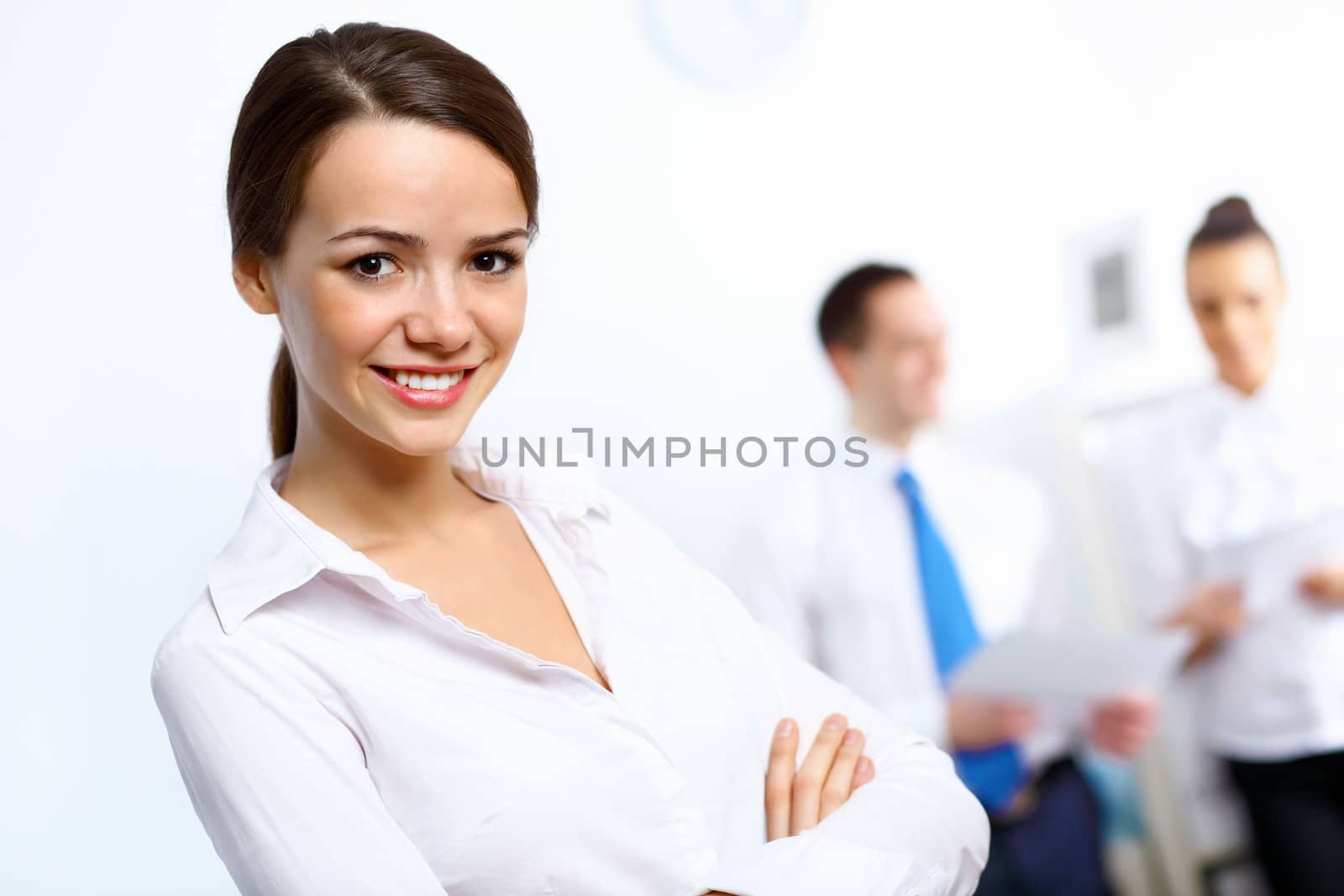 Young businesswoman in the office by sergey_nivens