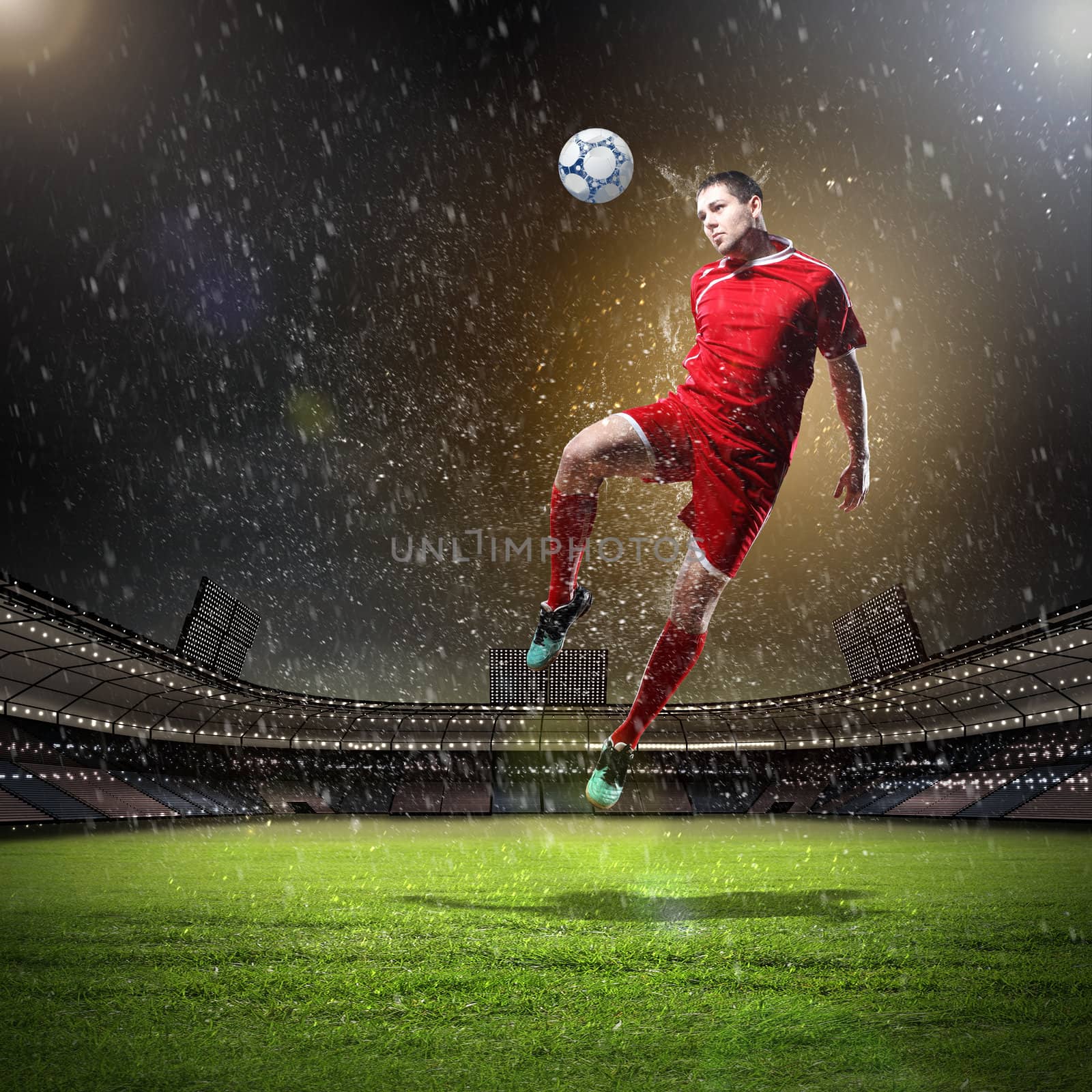 football player in red shirt striking the ball at the stadium under rain