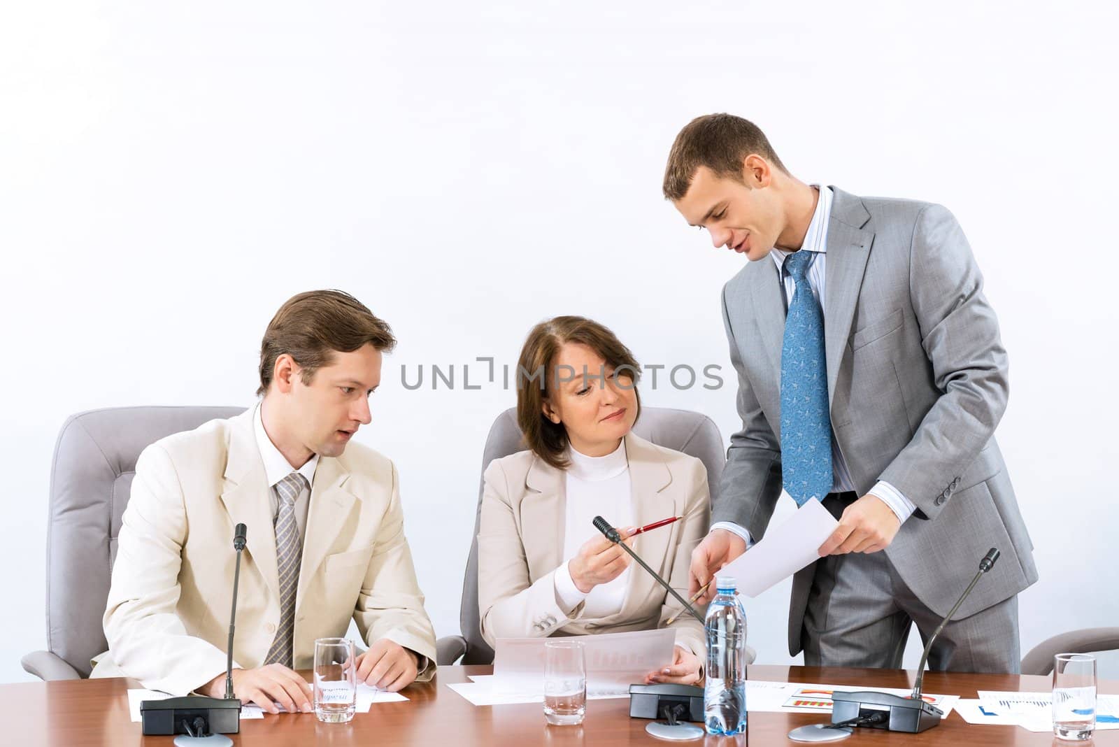 group of business people discussing documents, teamwork