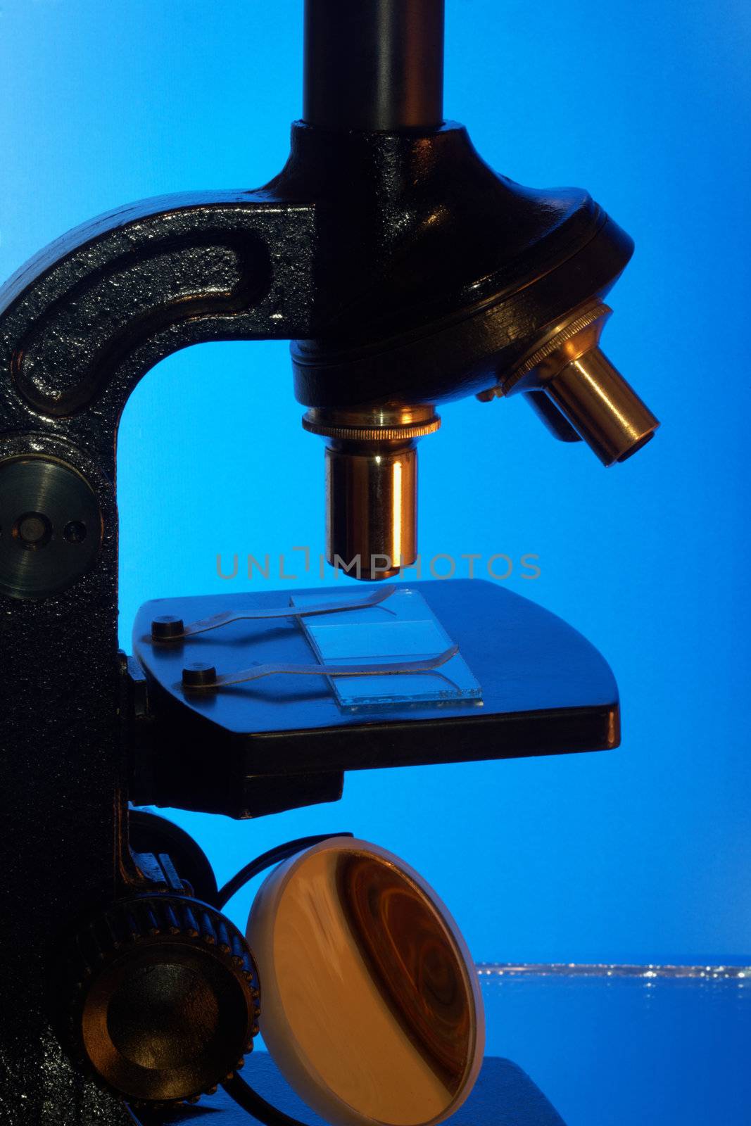 Microscope for the analysis on a blue background