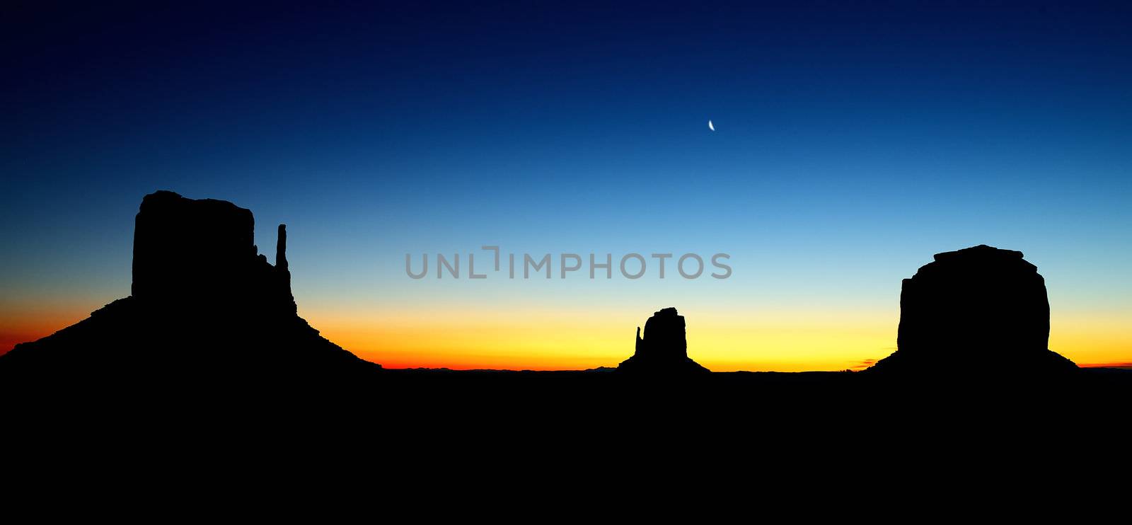 the Monument Valley Tribal Park At Sunrise, Arizona