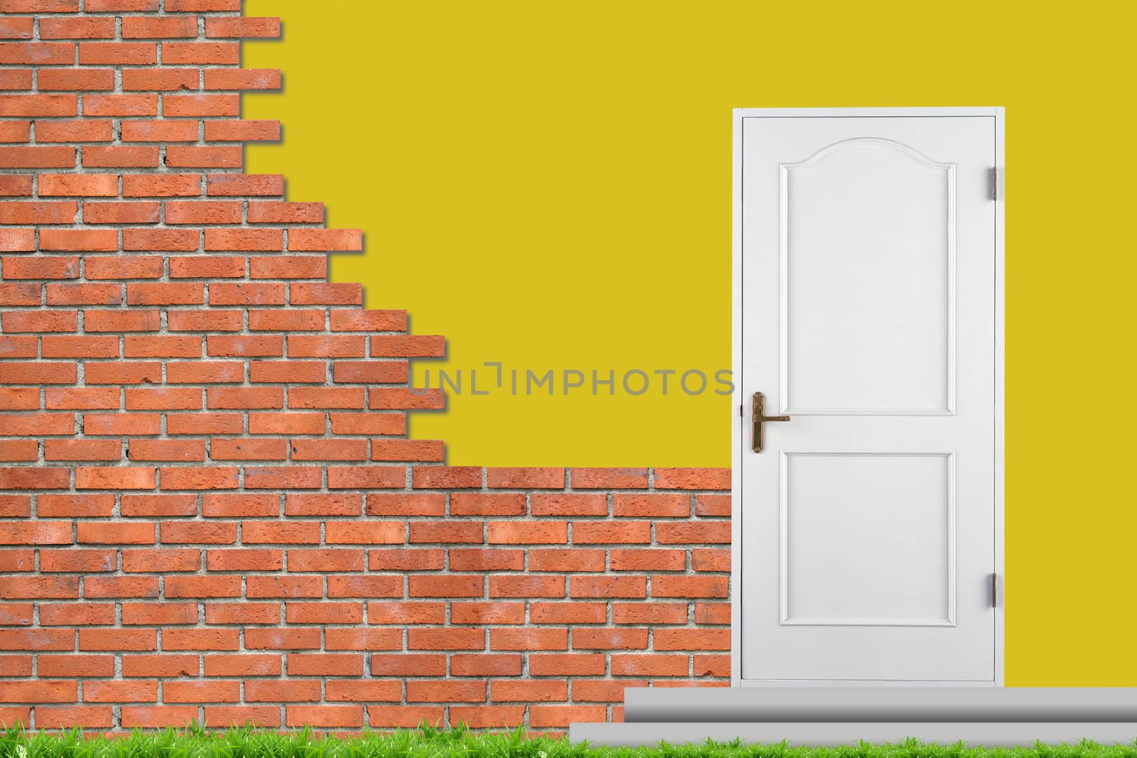 Brick wall and white closed doors. The unfinished house
