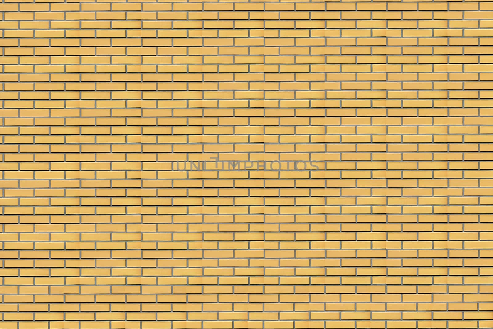Wall of a house from a yellow brick. A background