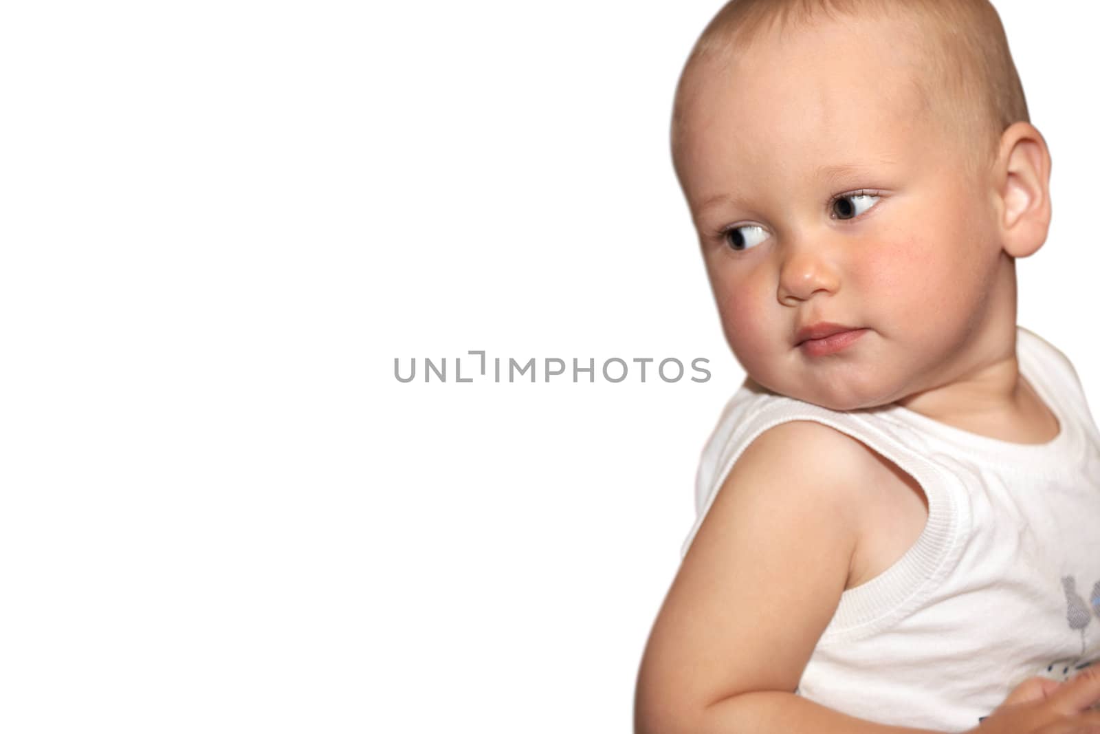The beautiful child with the large eyes on a white background