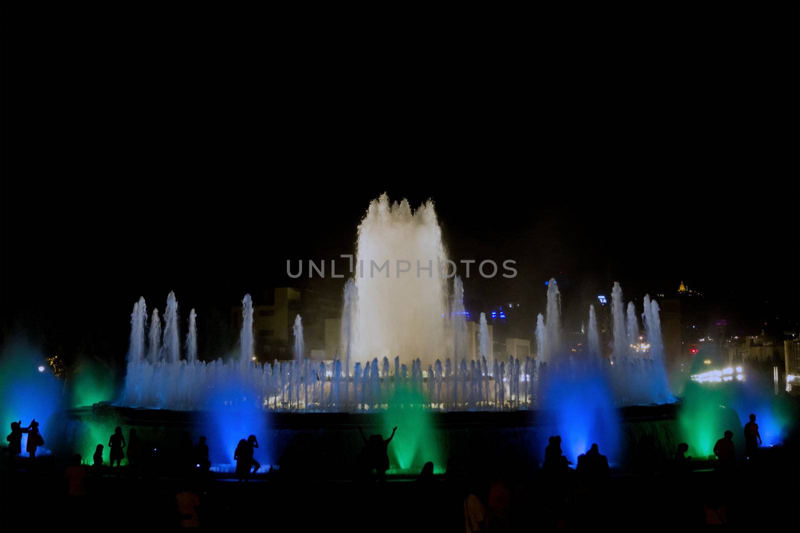 Barcelona Magic Fountain with silhouette of the people, Spain