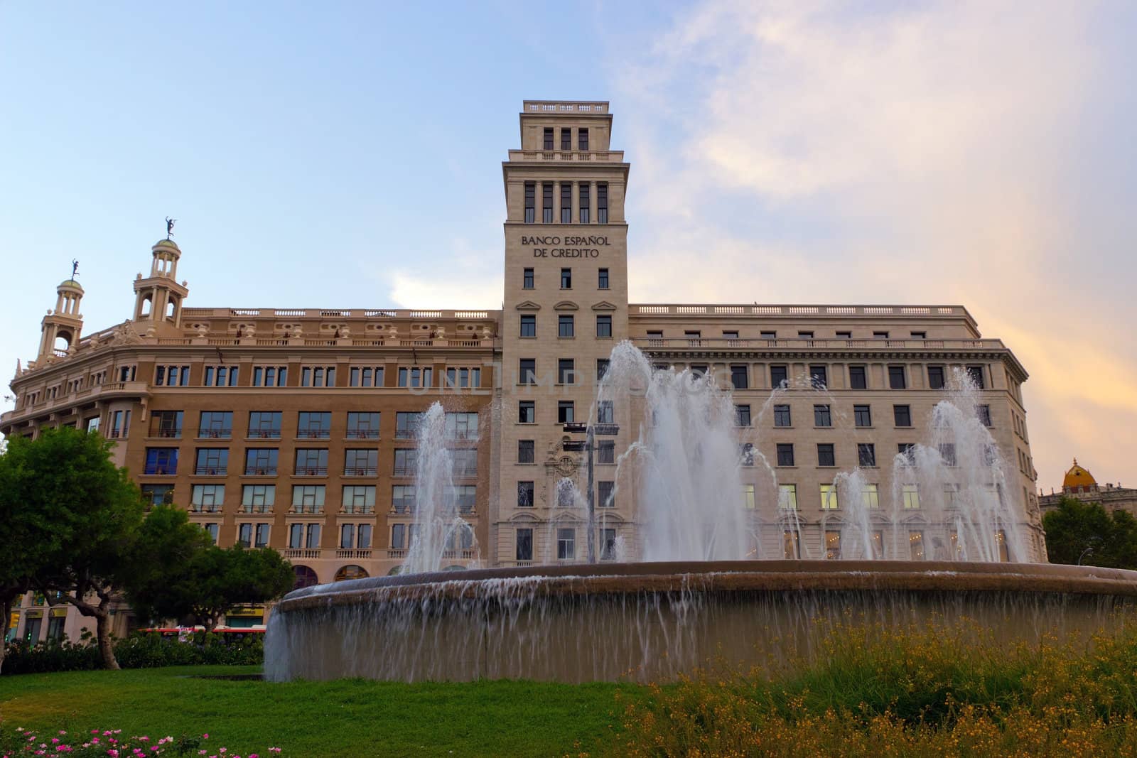 Bank and fountain Catalonia Plaza in Barcelona, Spain