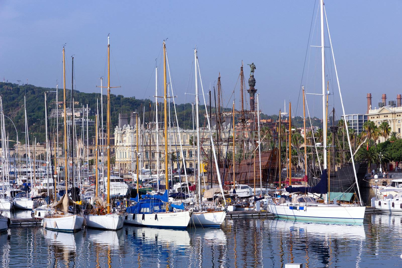 Christopher Columbus Statue and ships and yachts in Port Vell, Barcelona, Spain
