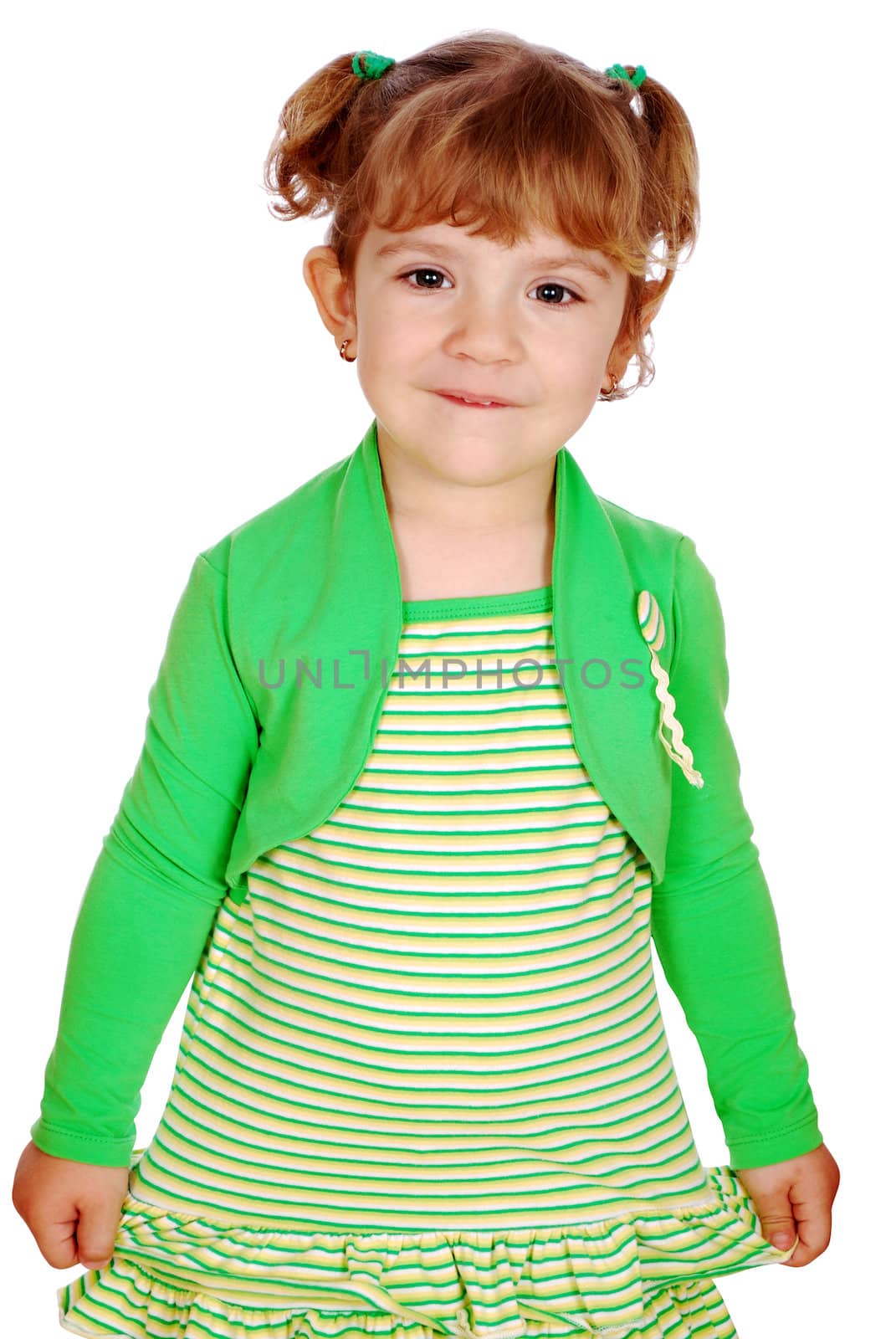 Little girl in yellow green dress posing