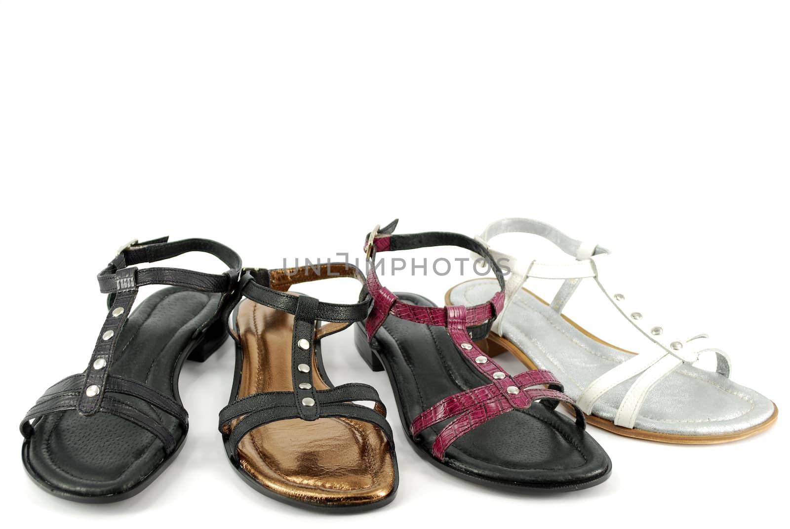 Woman new leather sandals on white