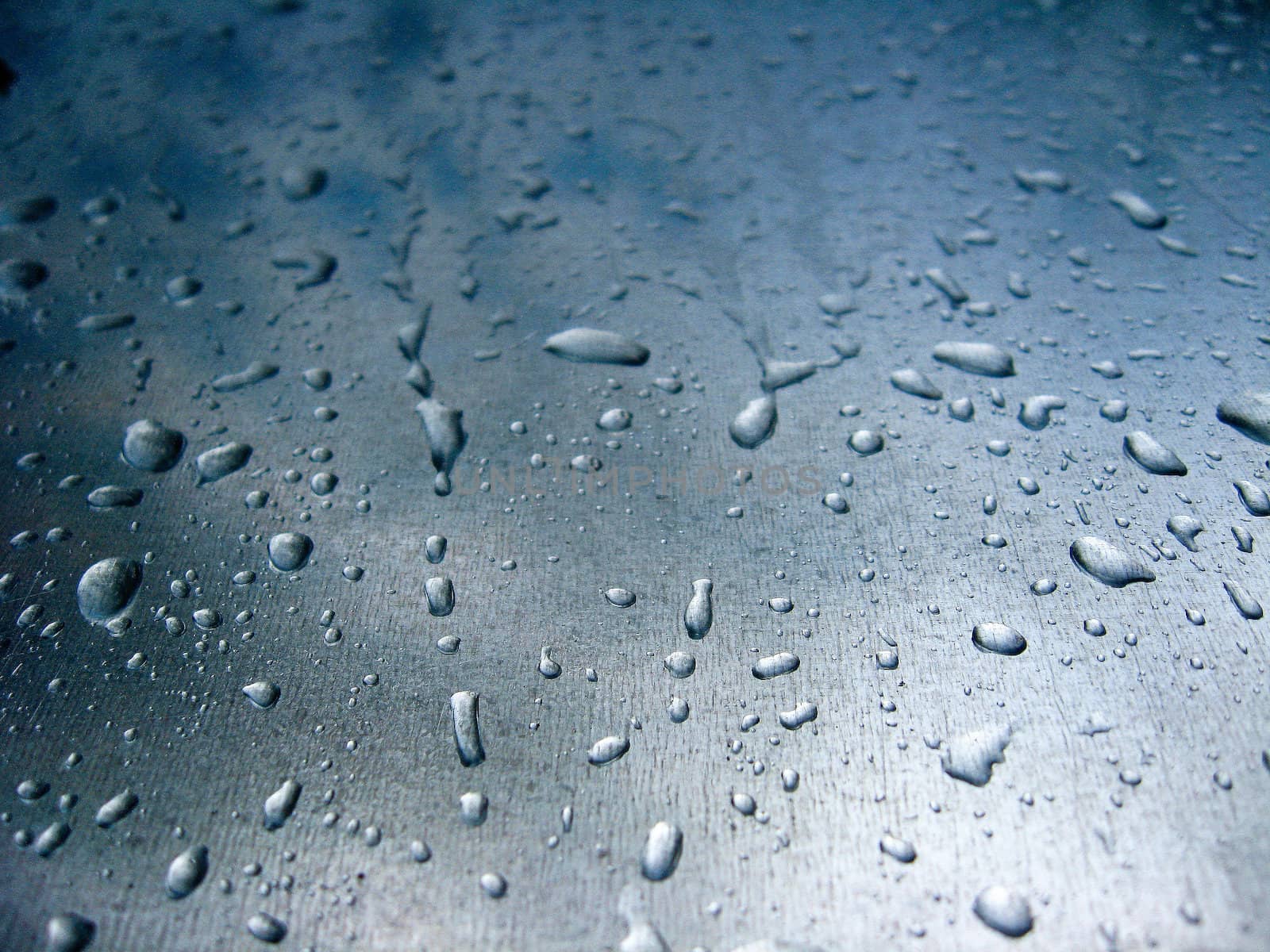 The perspired glass with drops of condensate