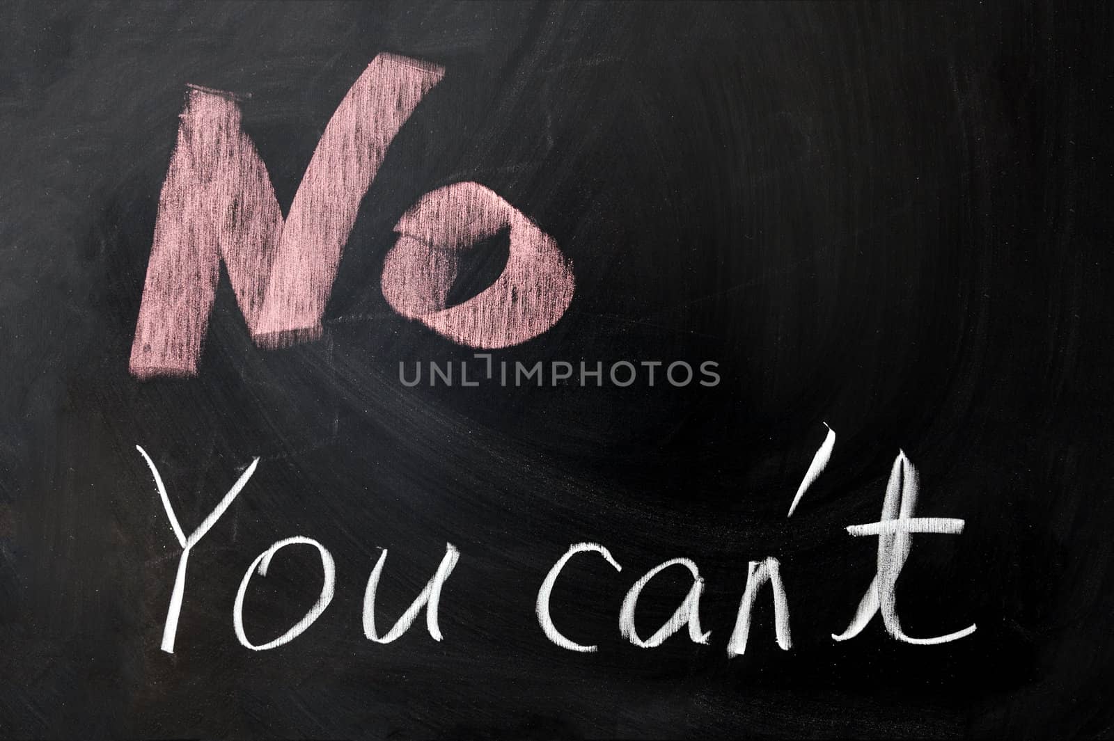 Chalk drawing -"No you can't" written on chalkboard