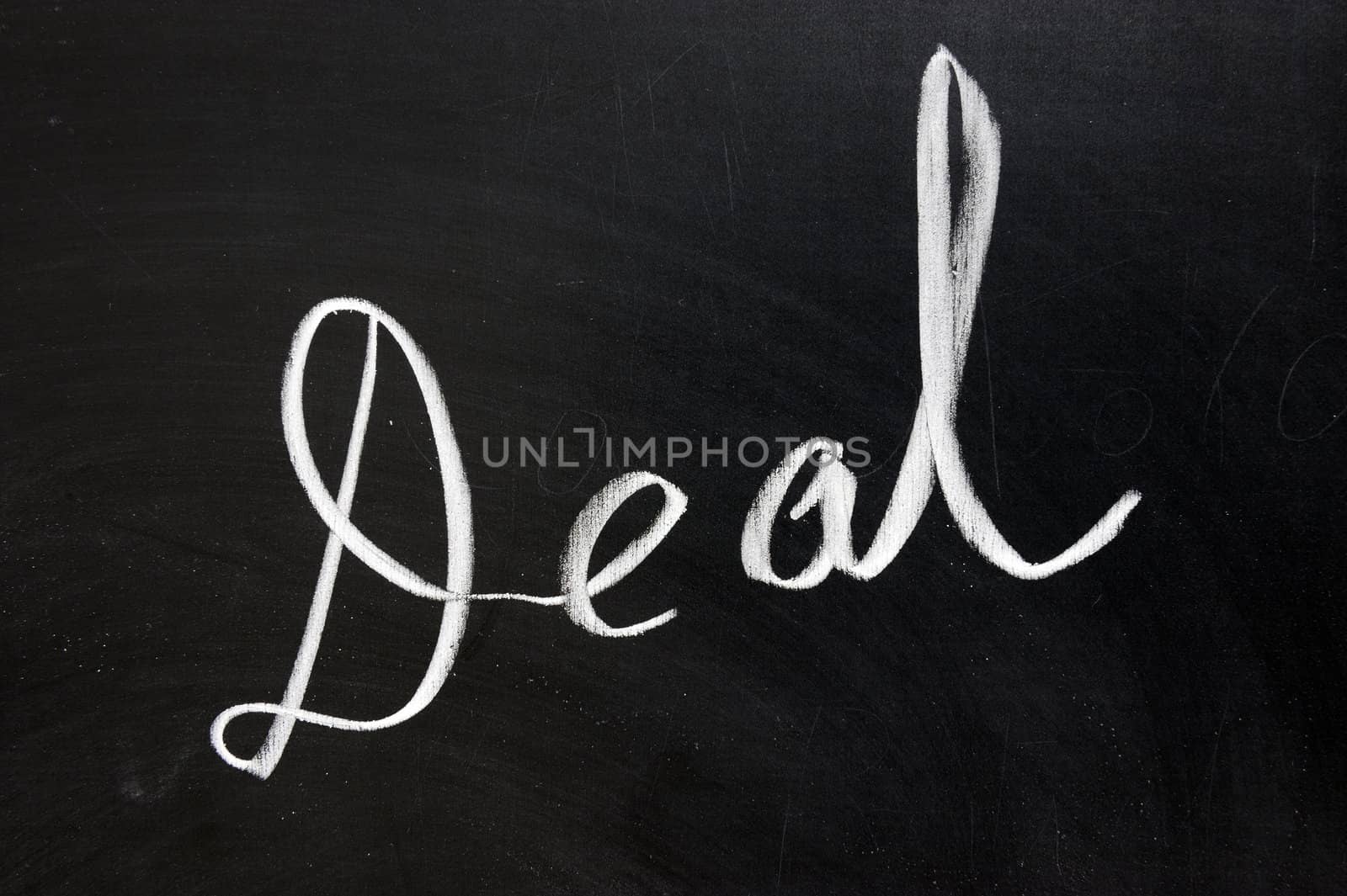 Chalk drawing - "Deal" word written on the chalkboard