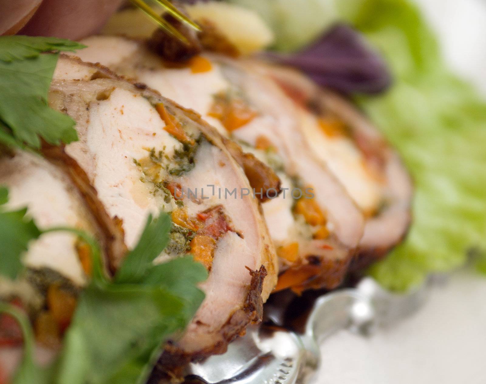 Beautiful sliced food arrangement with some vegetables. Shallow depth-of-field