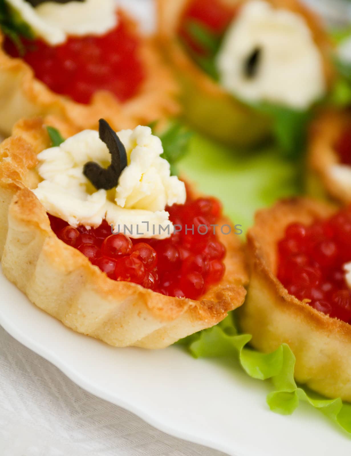   Canapes with red caviar   . Shallow depth-of-field