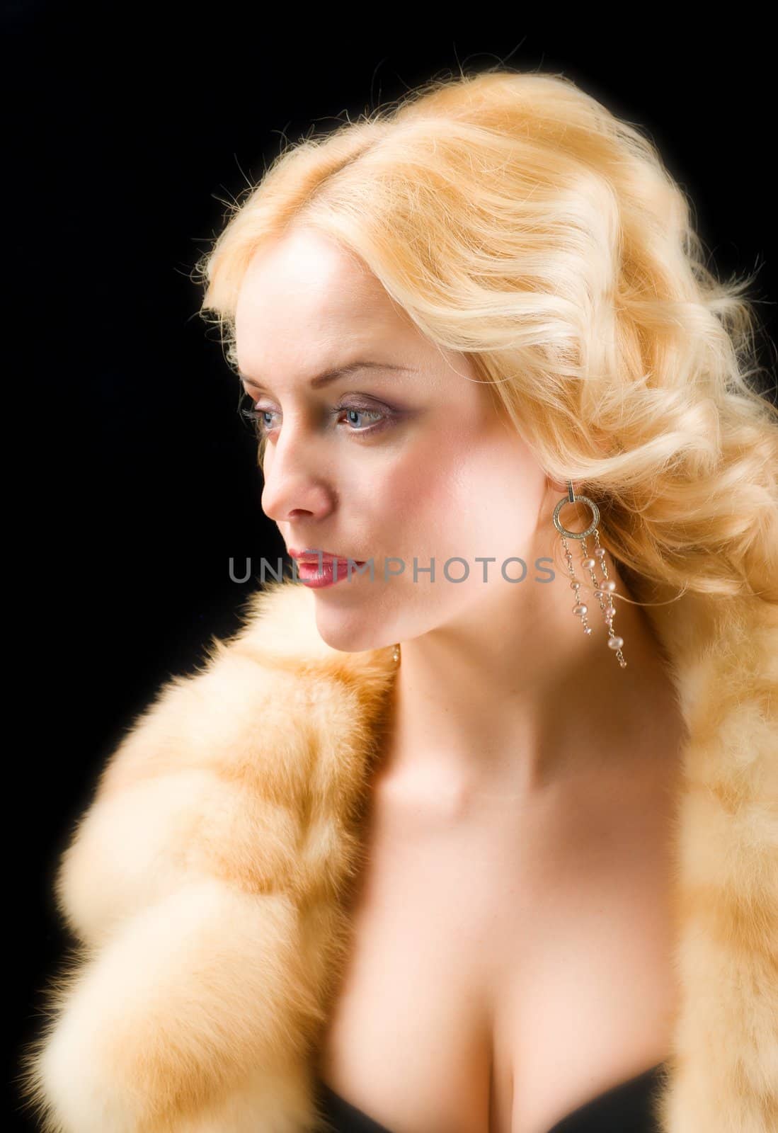 Sexy model wearing winter fur coat  by Fanfo