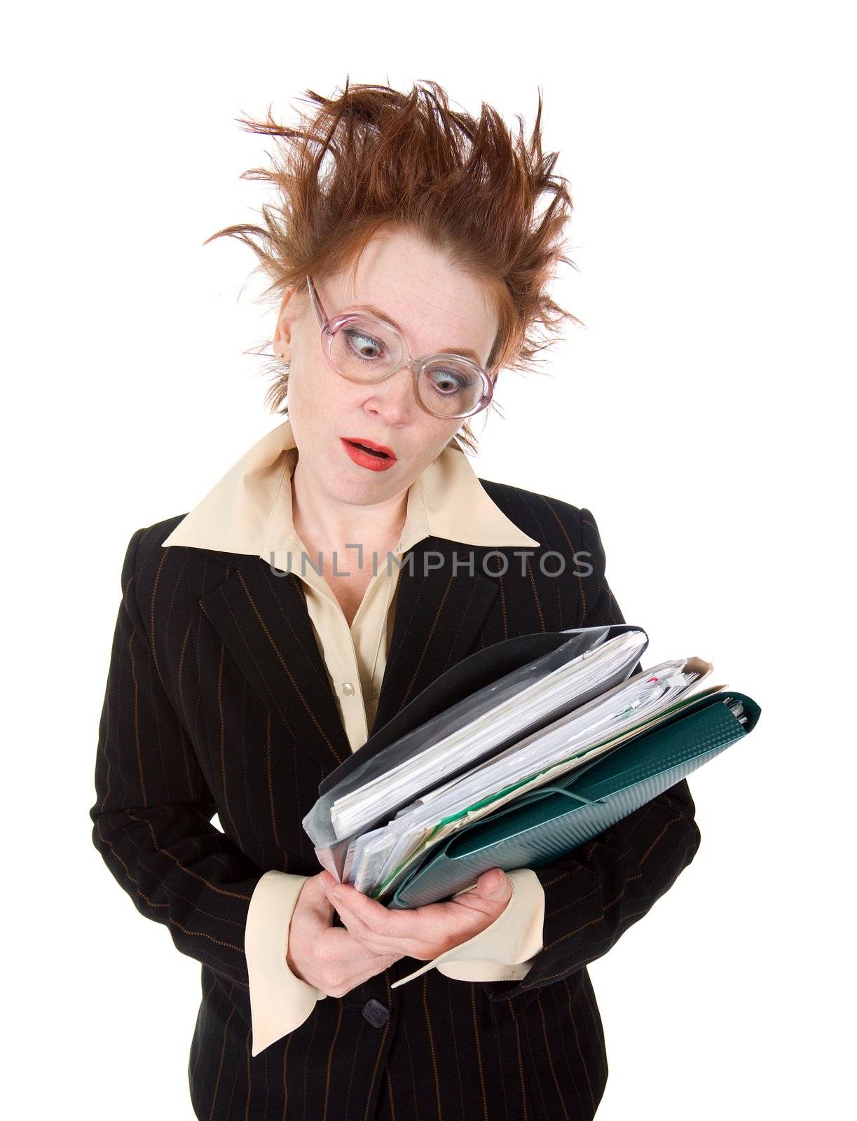   stressed crazy Businesswoman with huge stack of paperwork.isolated on white 