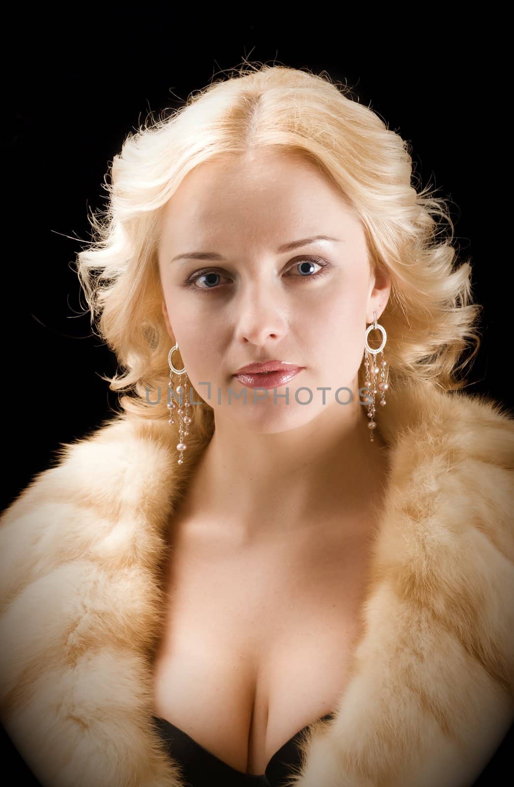 Sexy model wearing winter fur coat  by Fanfo