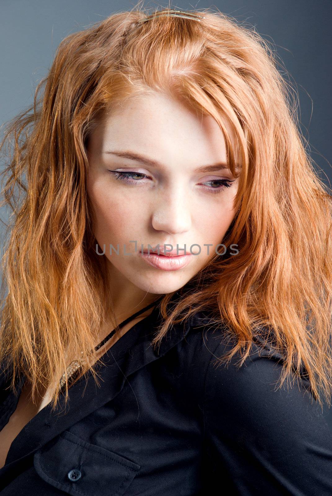 fashion portrait of a red hair sexy woman, studio shot 