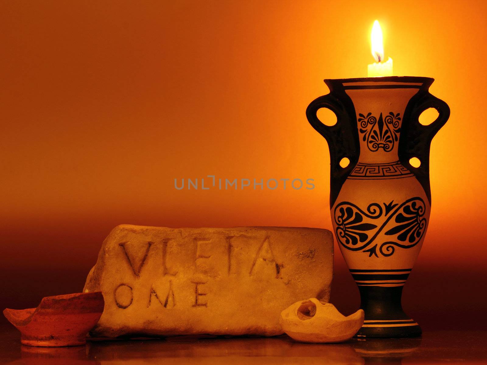 candle and marble of rome