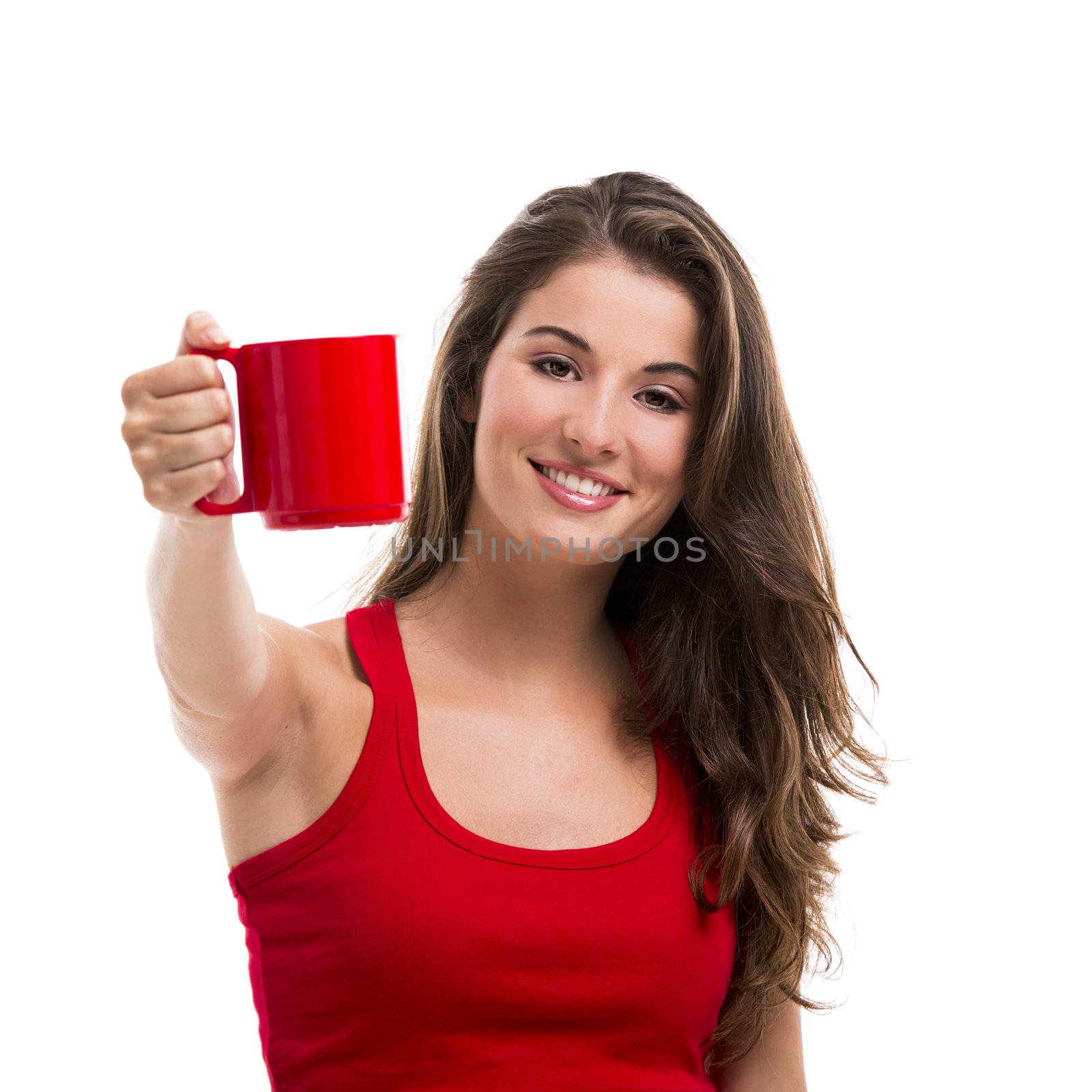 Beautiful young woman over a white background drinking a hot coffee