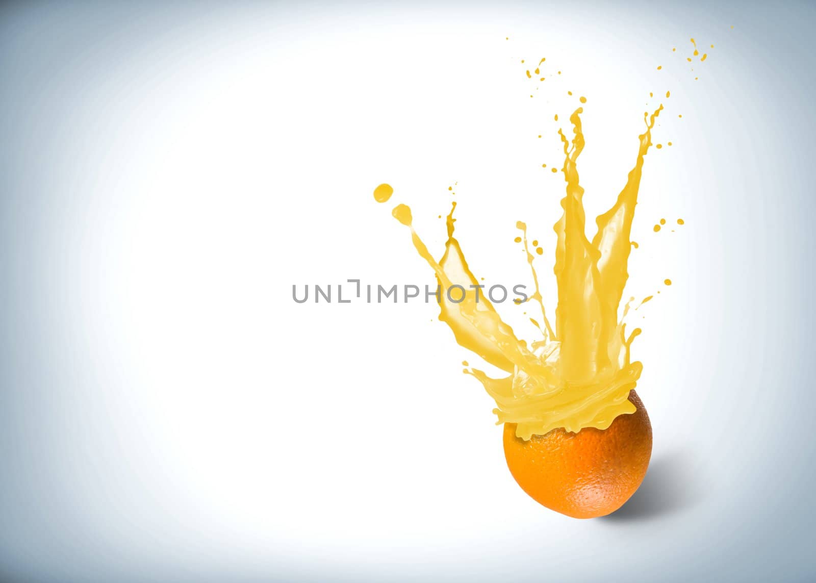 ice cubes fall into the orange, spray and splashes of juice