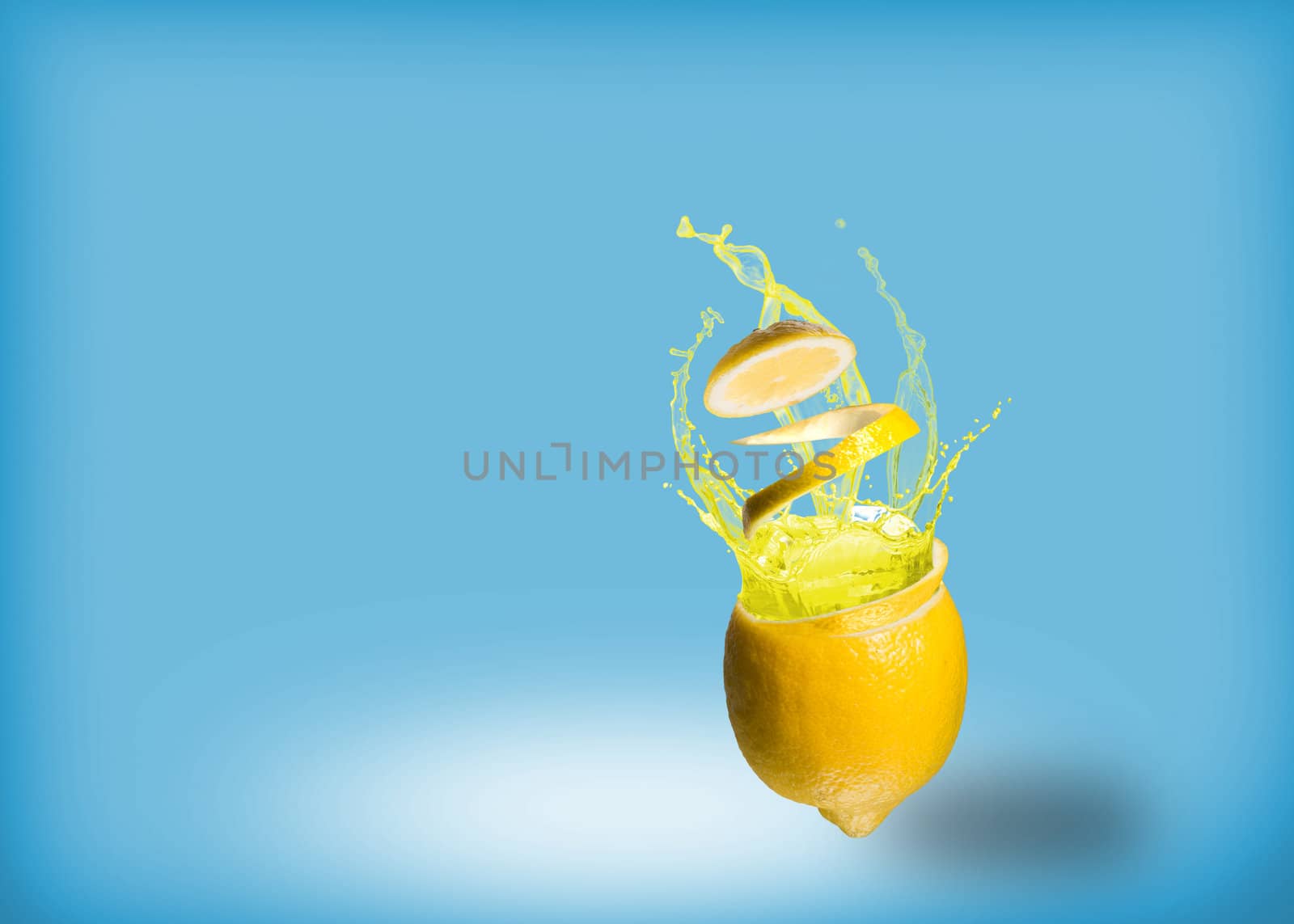 ice and splashes of juice from a lemon, place for text