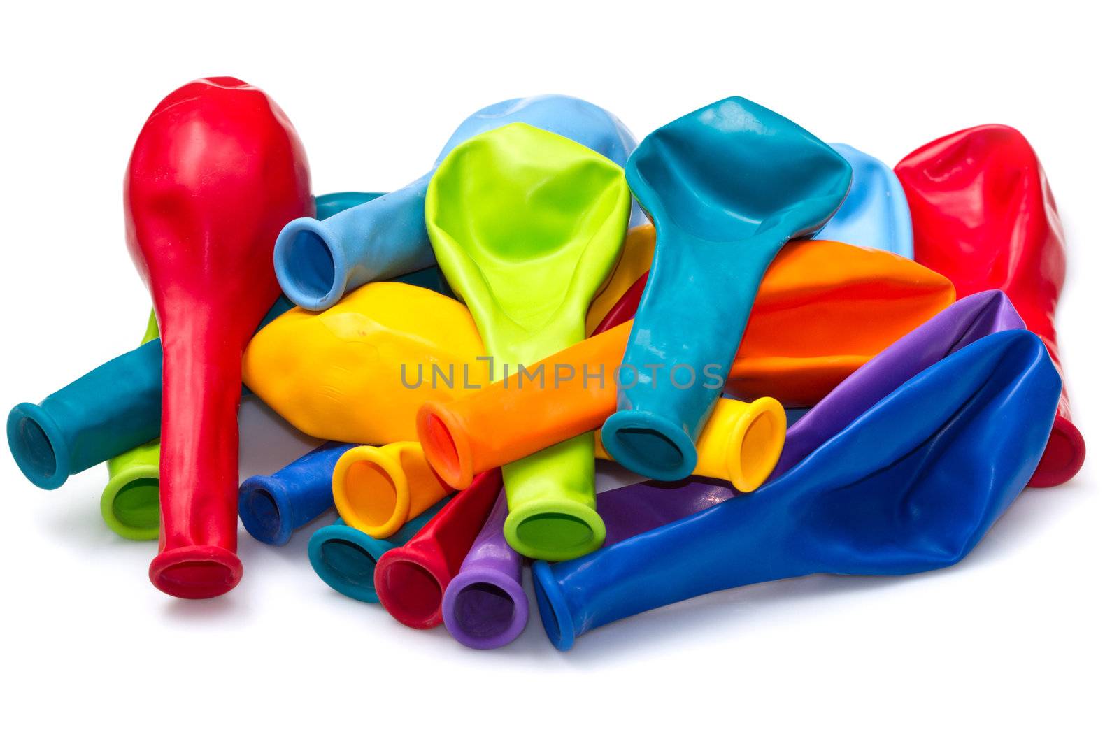 colorful deflated balloons, isolated on white