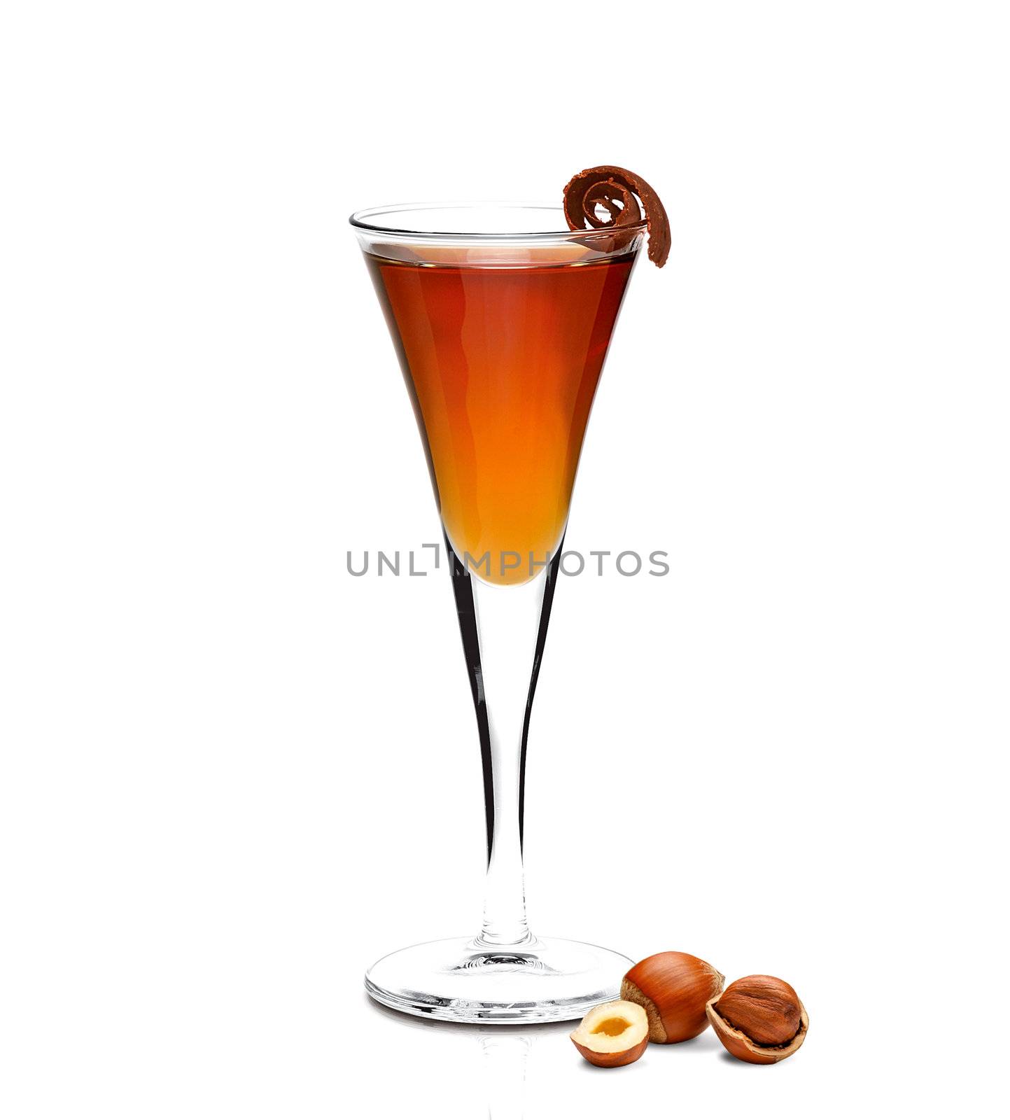 Truffle Cocktail drink on a tall glass and hazelnuts on white background