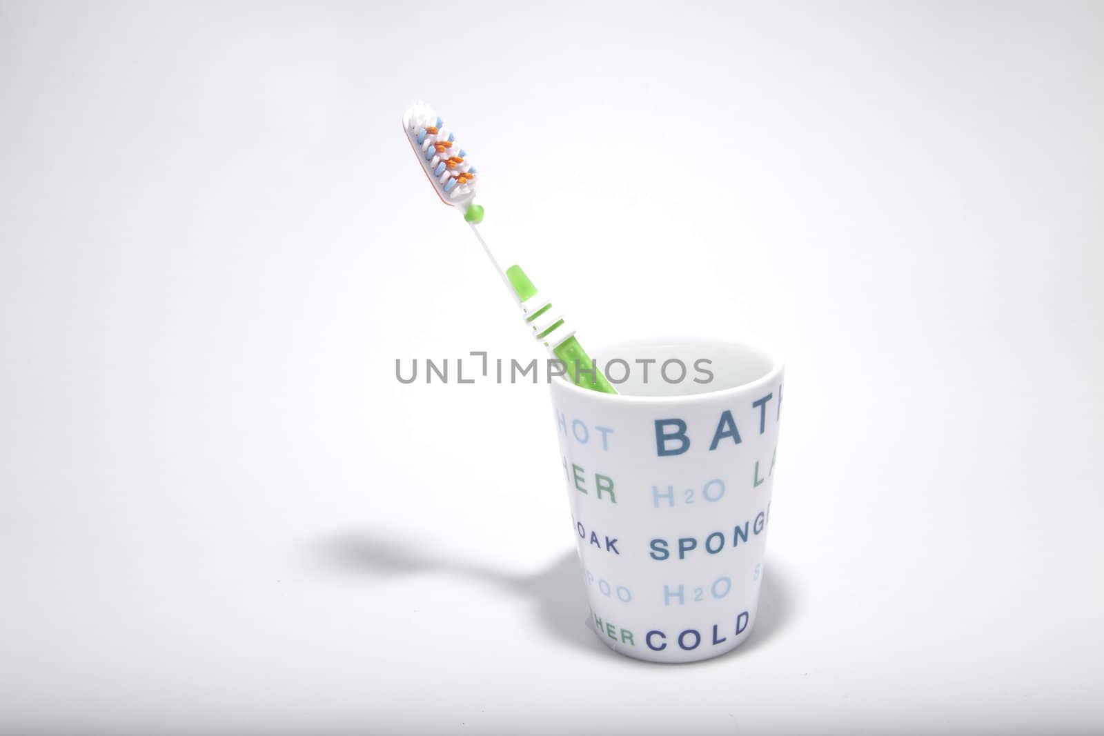 one toothbrush into one cup