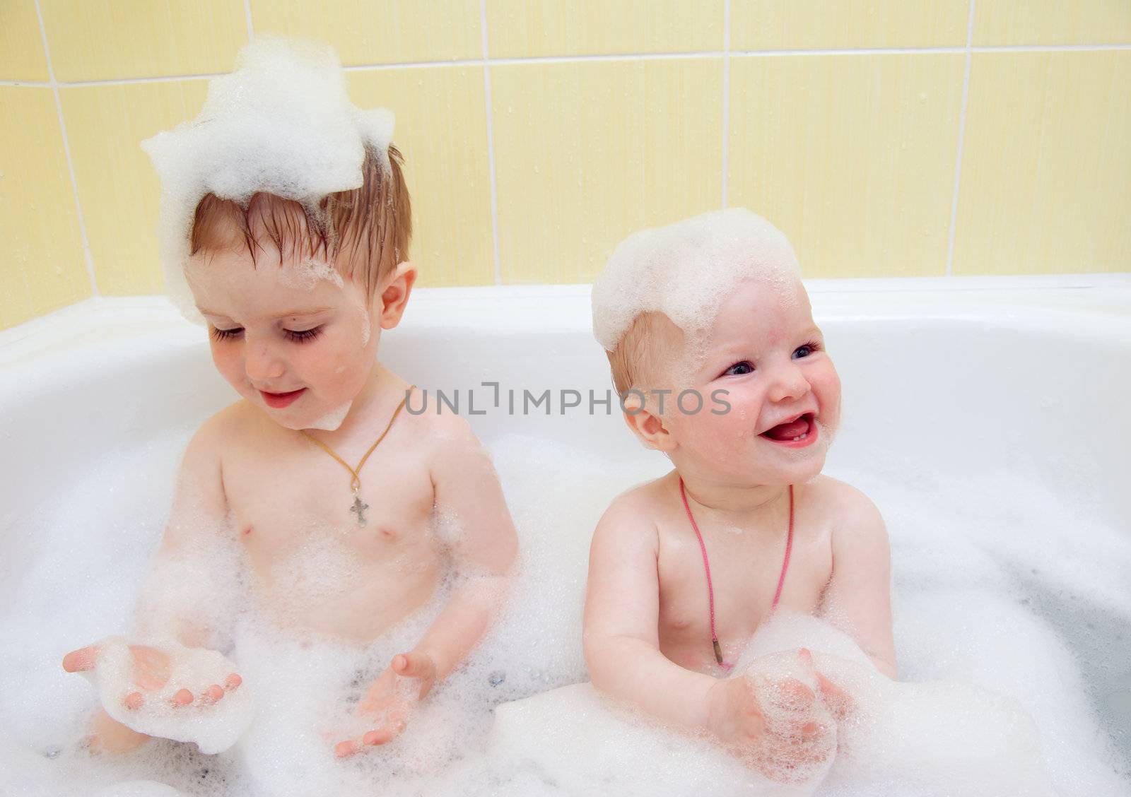 Bathing child.Health and hygiene.Small child in bath