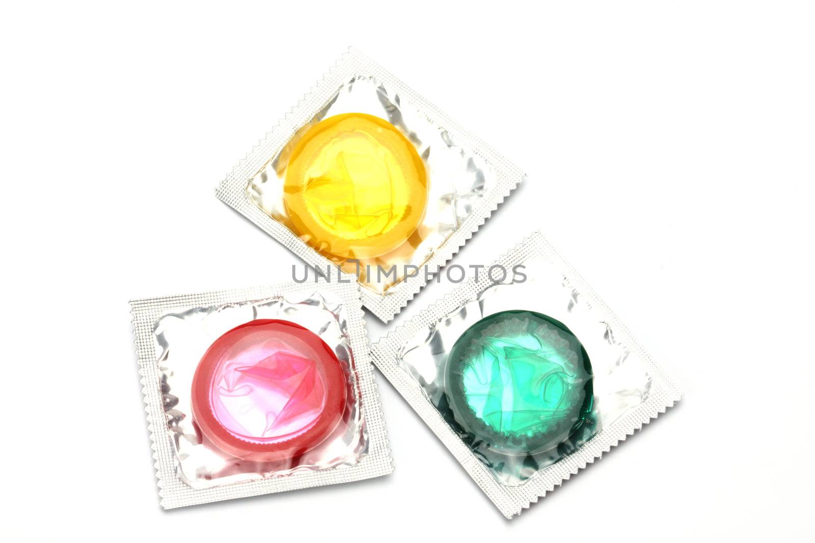 Colored condoms pack  on  white