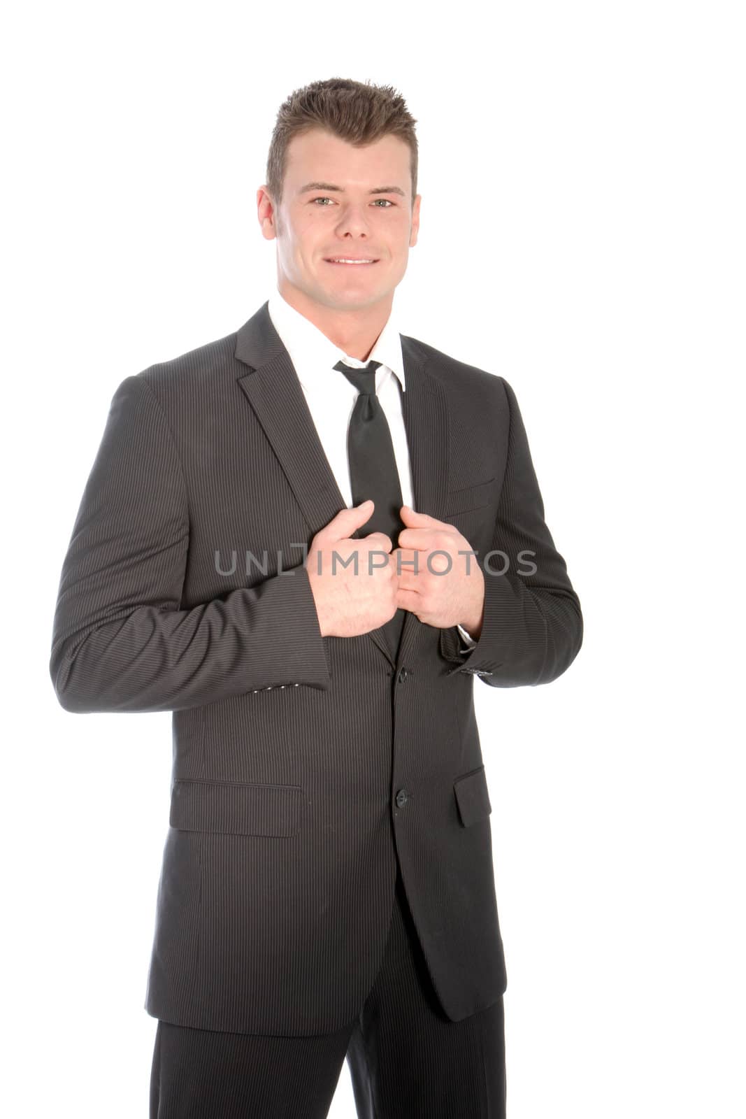 Smiling young man wearing slim black business suit