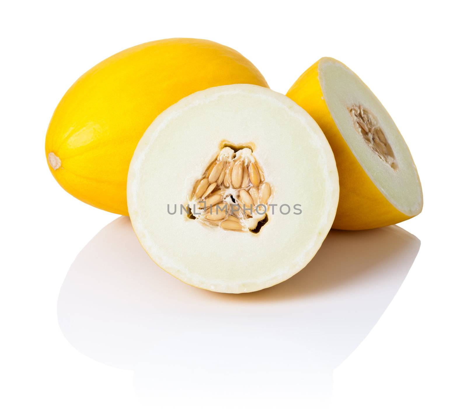 Two honeydew melons on white background. One sliced in half, second whole