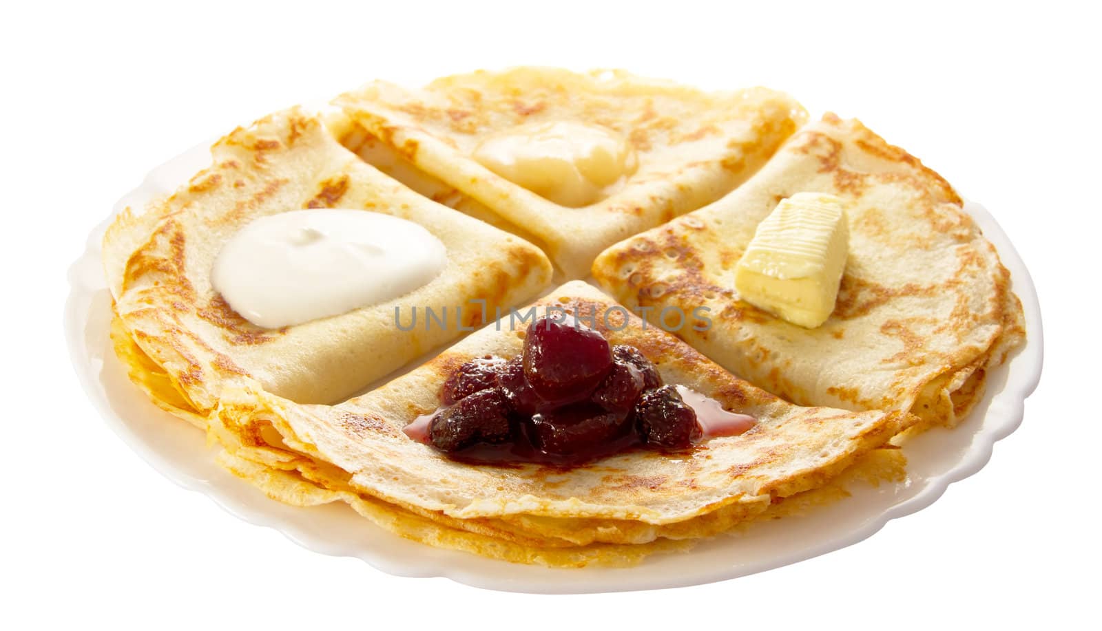 four pancakes with different fillings on a white plate (isolated object)