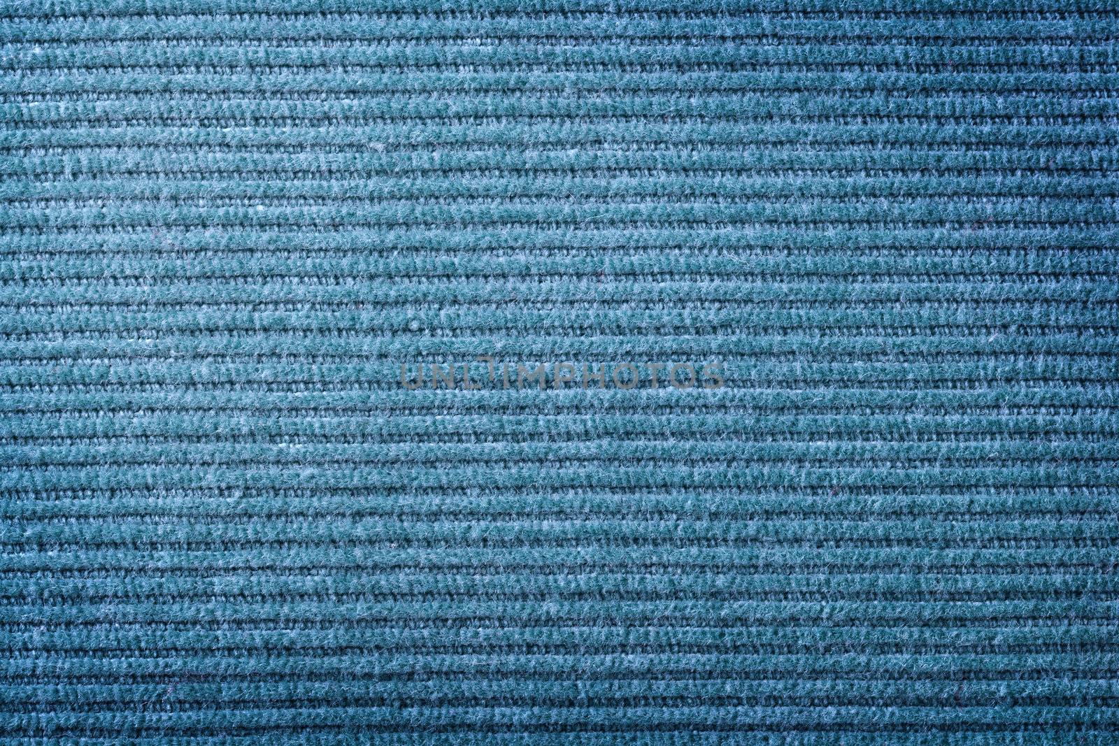 Blue corduroy fabric texture for background. Close up shot
