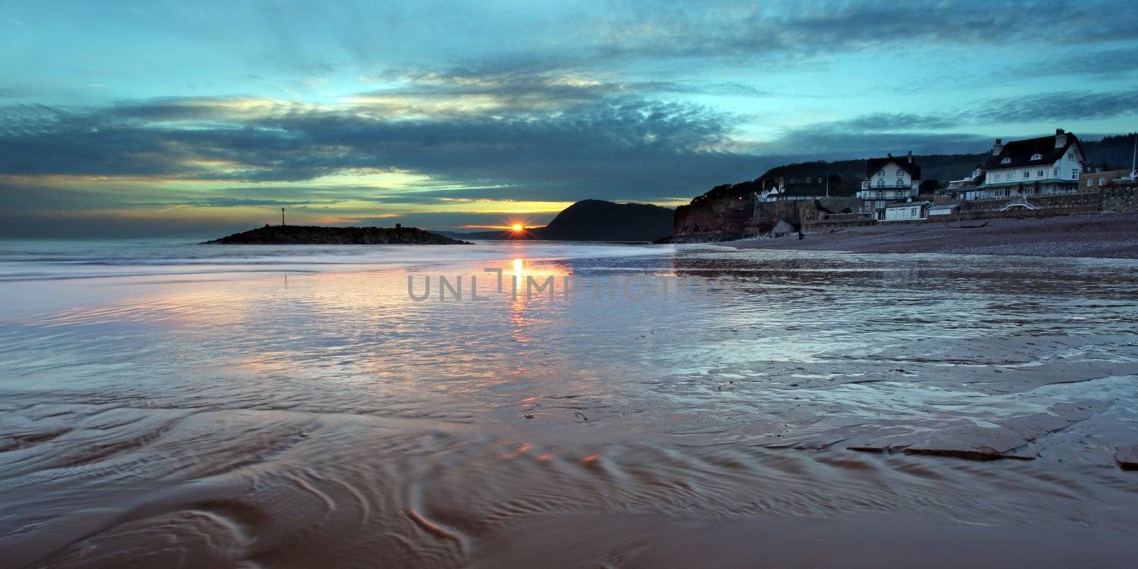 The sunsets over sidmouth beach in east devon south west england