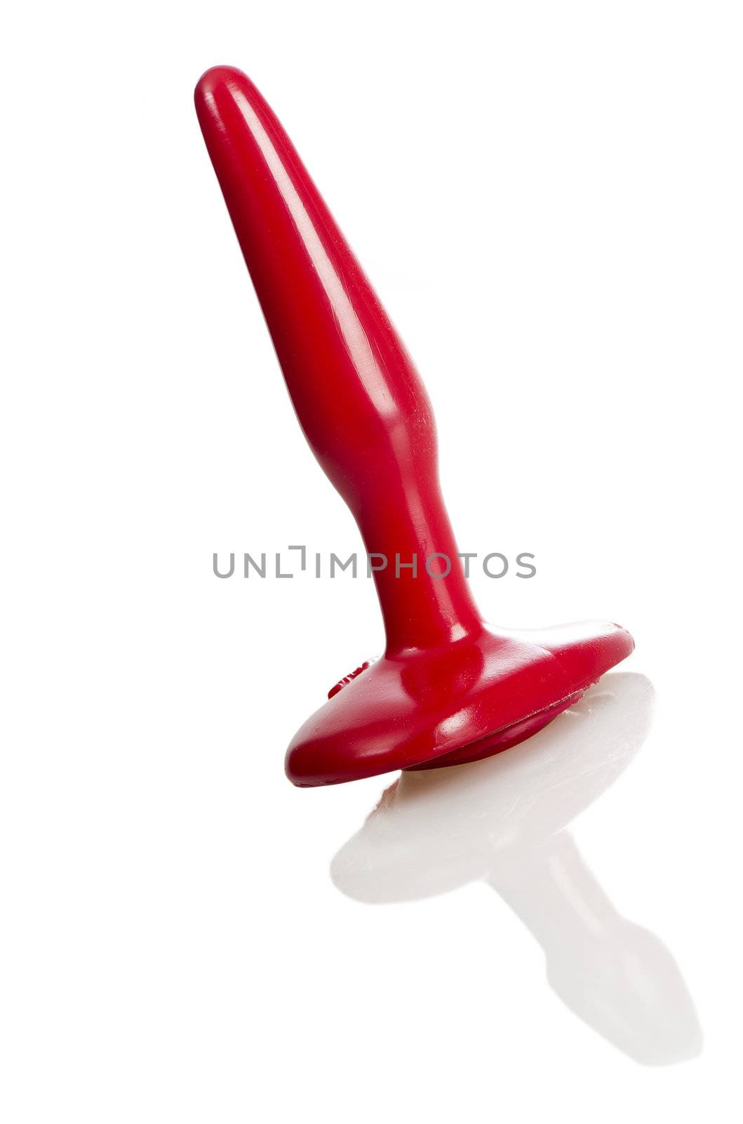 A red sex toy (anal plug) made of rubber/latex, isolated on white.
